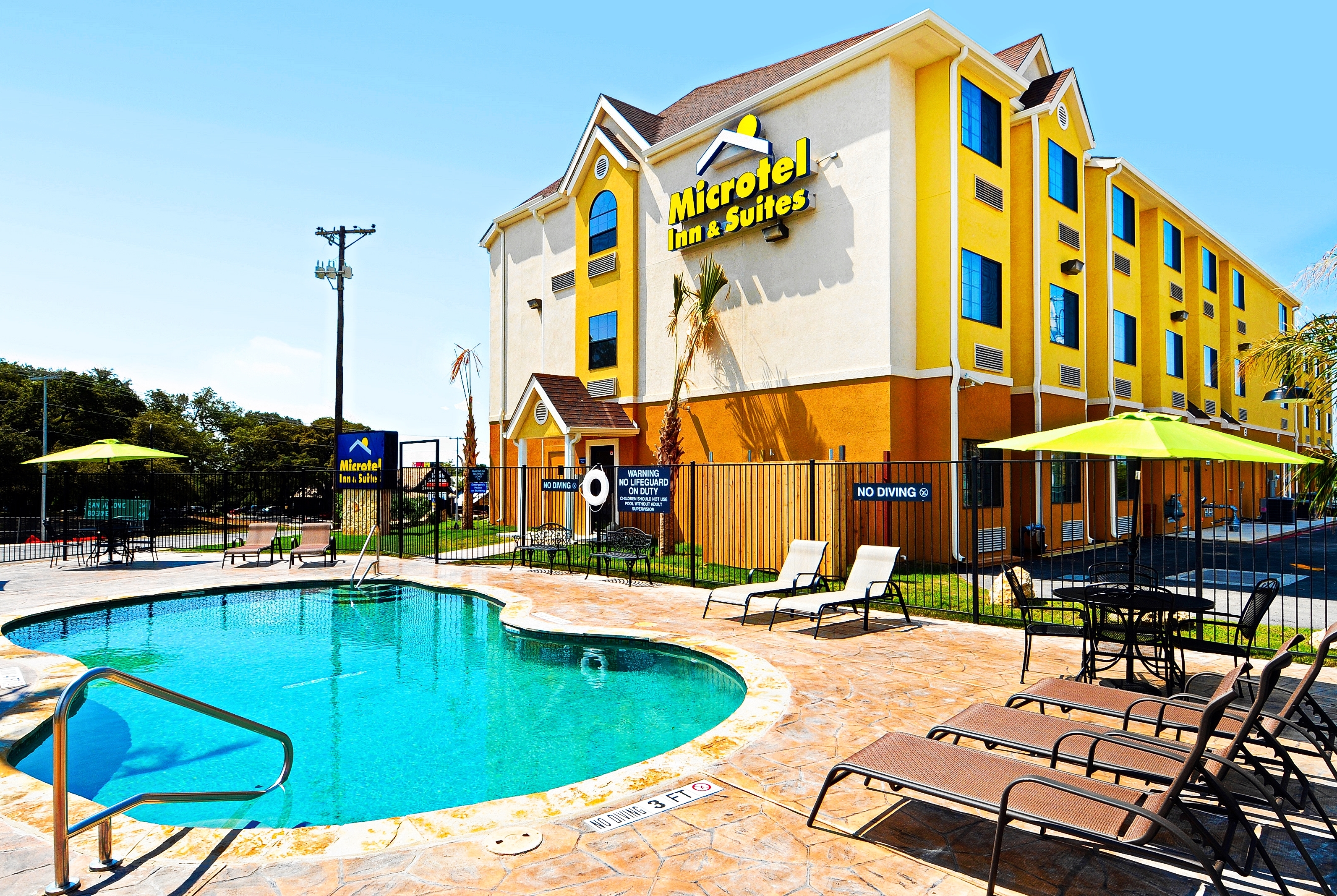 Pool daytime image at the Microtel Inn & Suites by Wyndham New Braunfels in New Braunfels, Texas