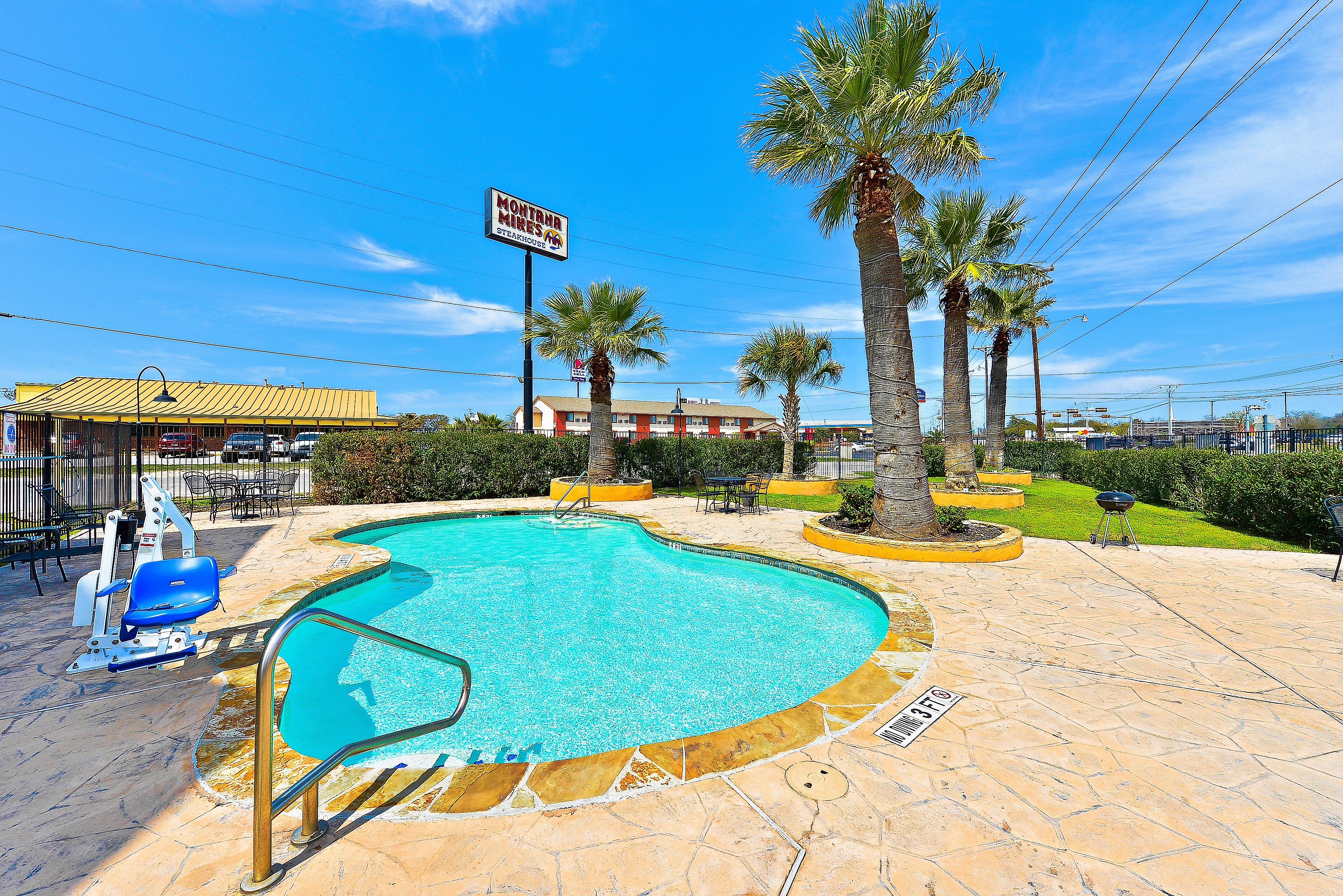 Pool daytime image at the Microtel Inn & Suites by Wyndham New Braunfels in New Braunfels, Texas