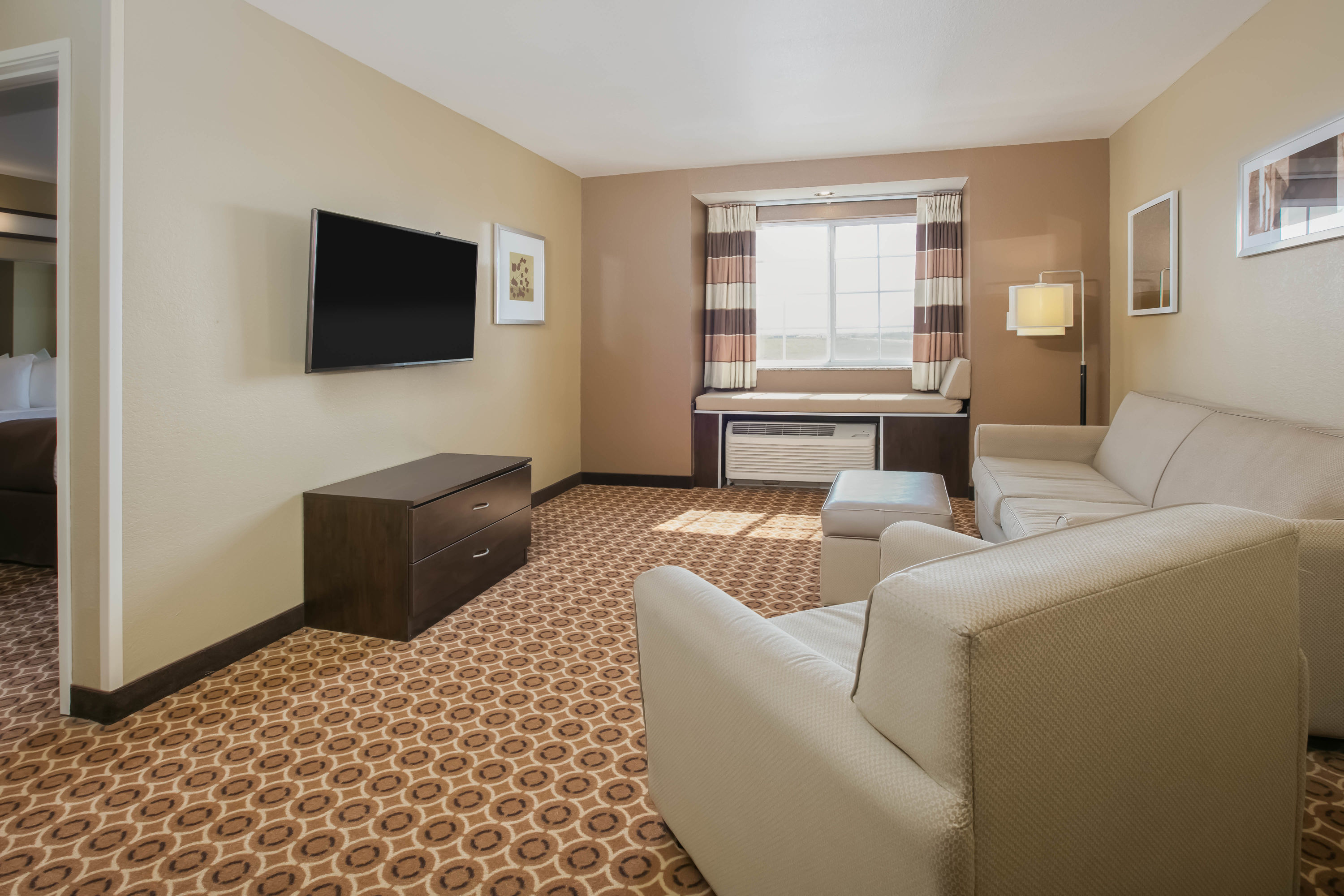 Microtel Inn & Suites By Wyndham Pecos suite living room in Pecos, Texas