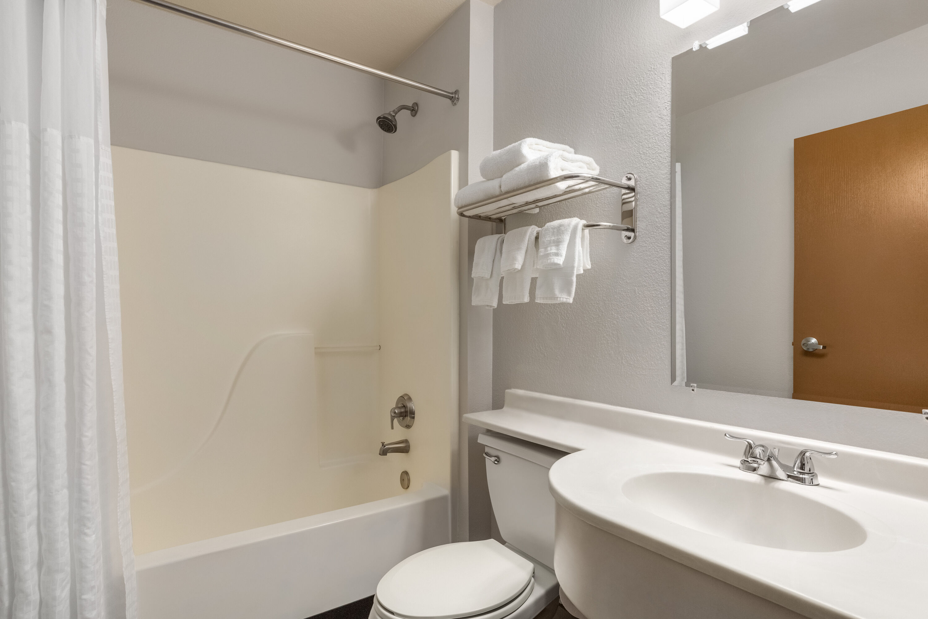 Guest room bath at the Microtel Inn & Suites by Wyndham Salt Lake City Airport in Salt Lake City, Utah