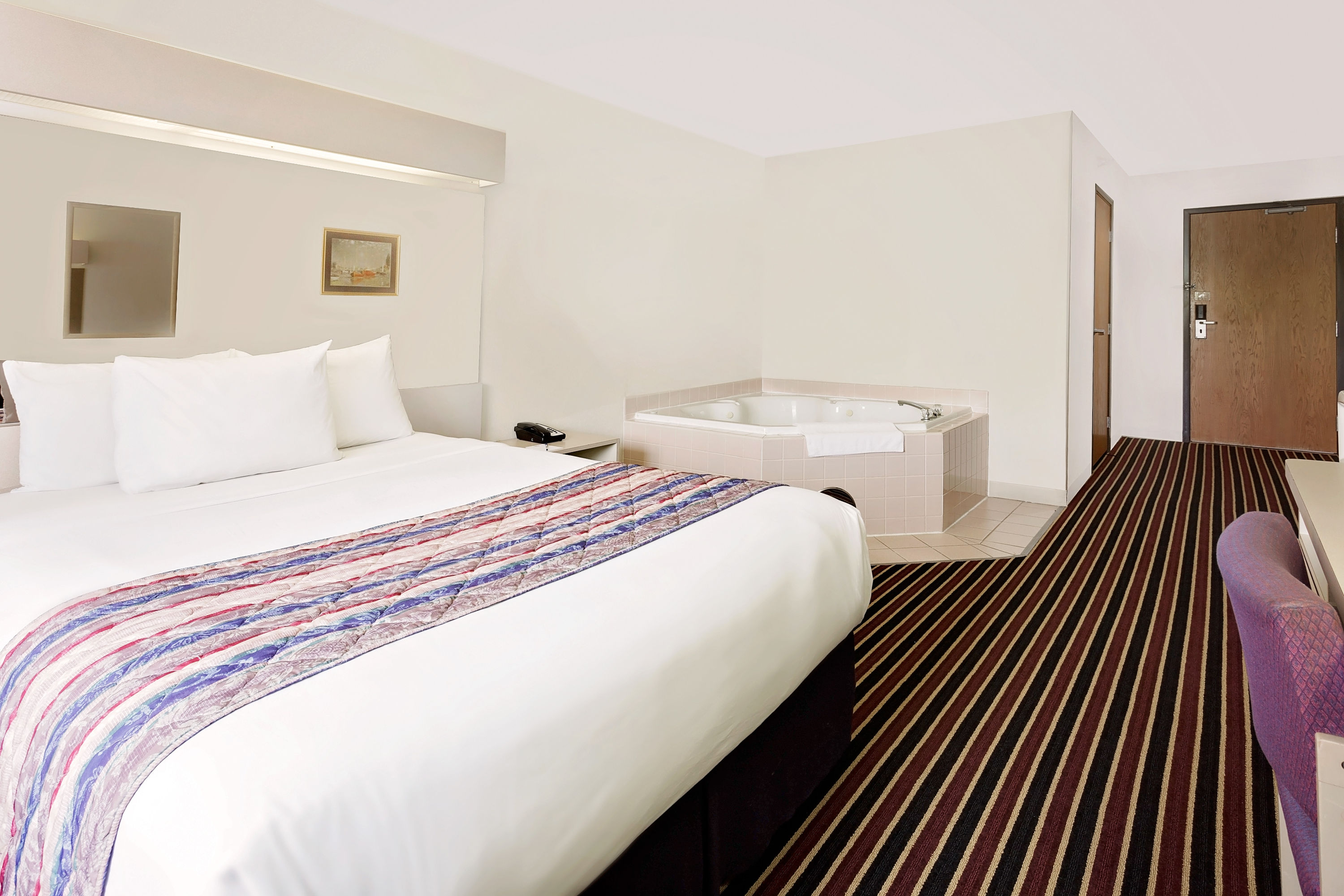 Guest room at the Microtel Inn & Suites by Wyndham Madison East in Madison, Wisconsin