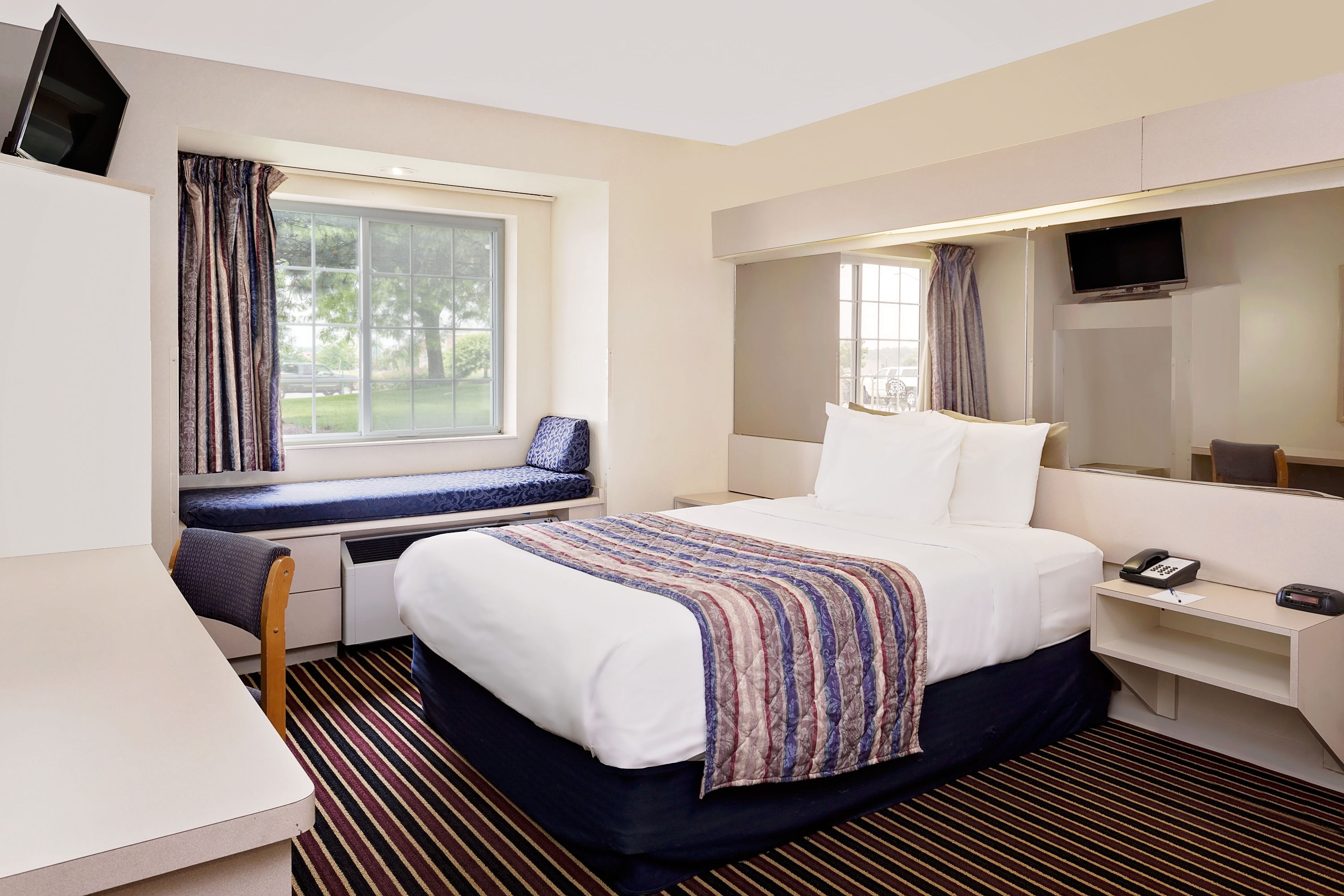 Guest room at the Microtel Inn & Suites by Wyndham Madison East in Madison, Wisconsin