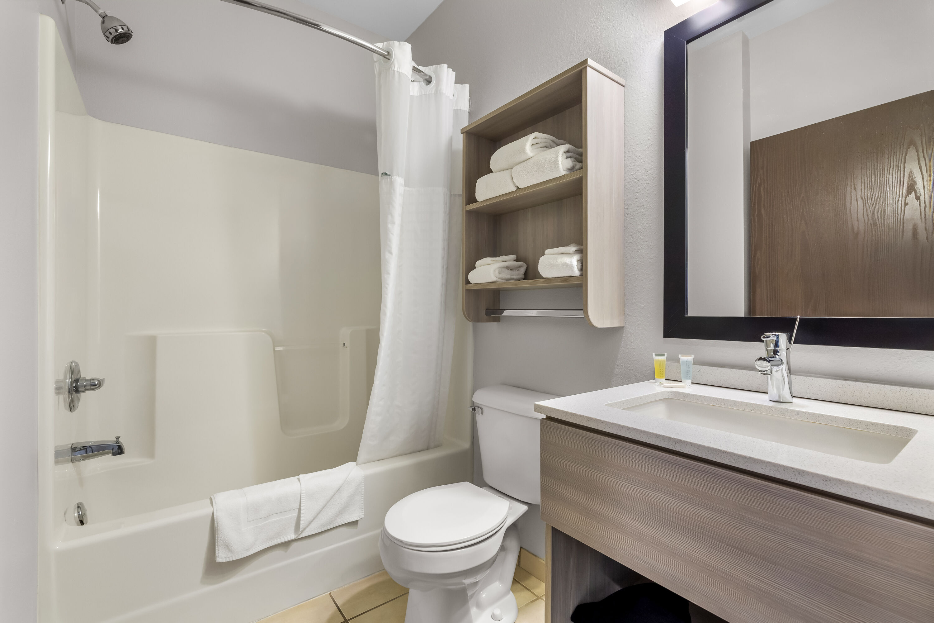 Guest room bath at the Microtel Inn & Suites by Wyndham Prairie du Chien in Prairie du Chien, Wisconsin