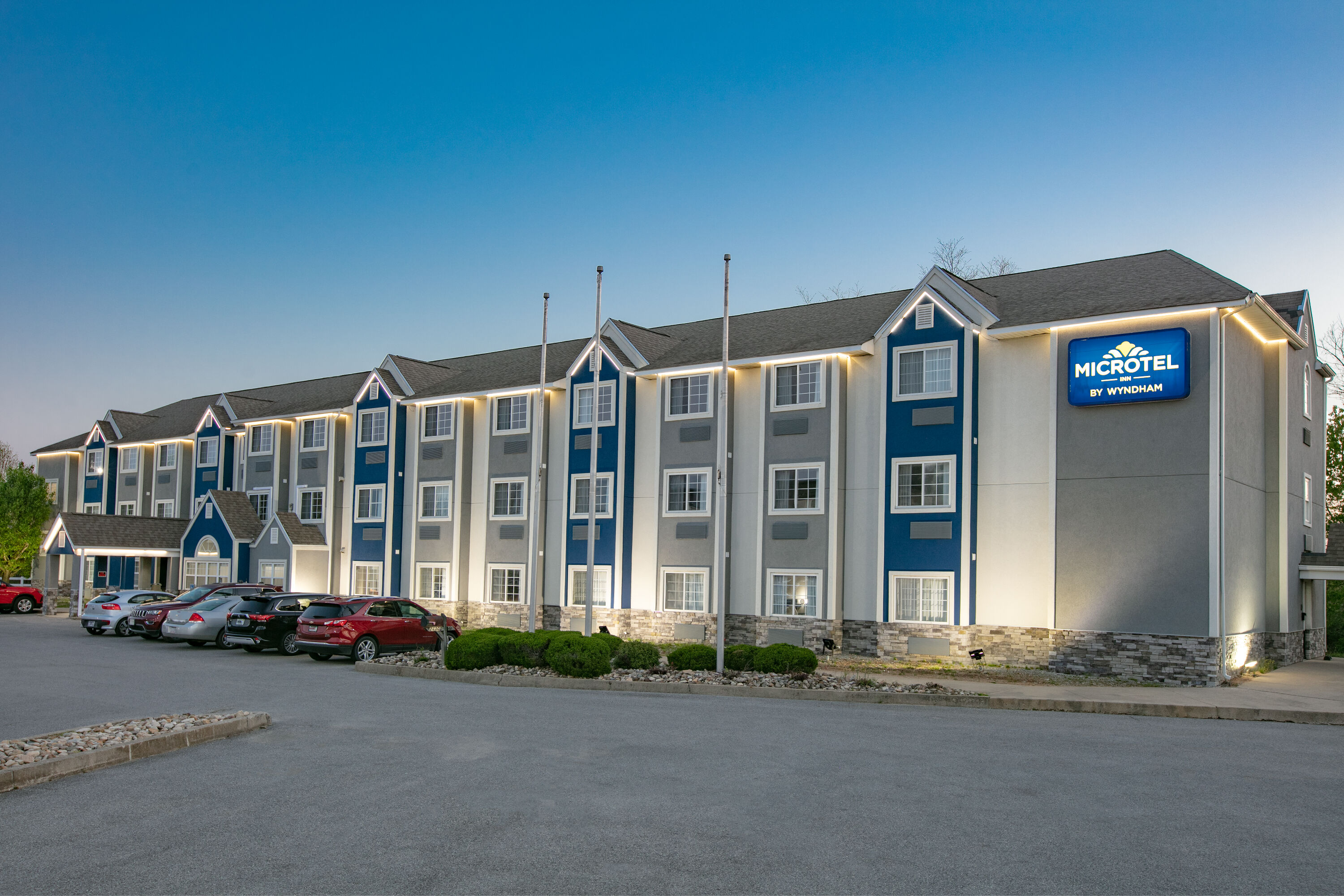 Exterior Dusk Image of Microtel Inn by Wyndham Beckley hotel in Beckley, West Virginia
