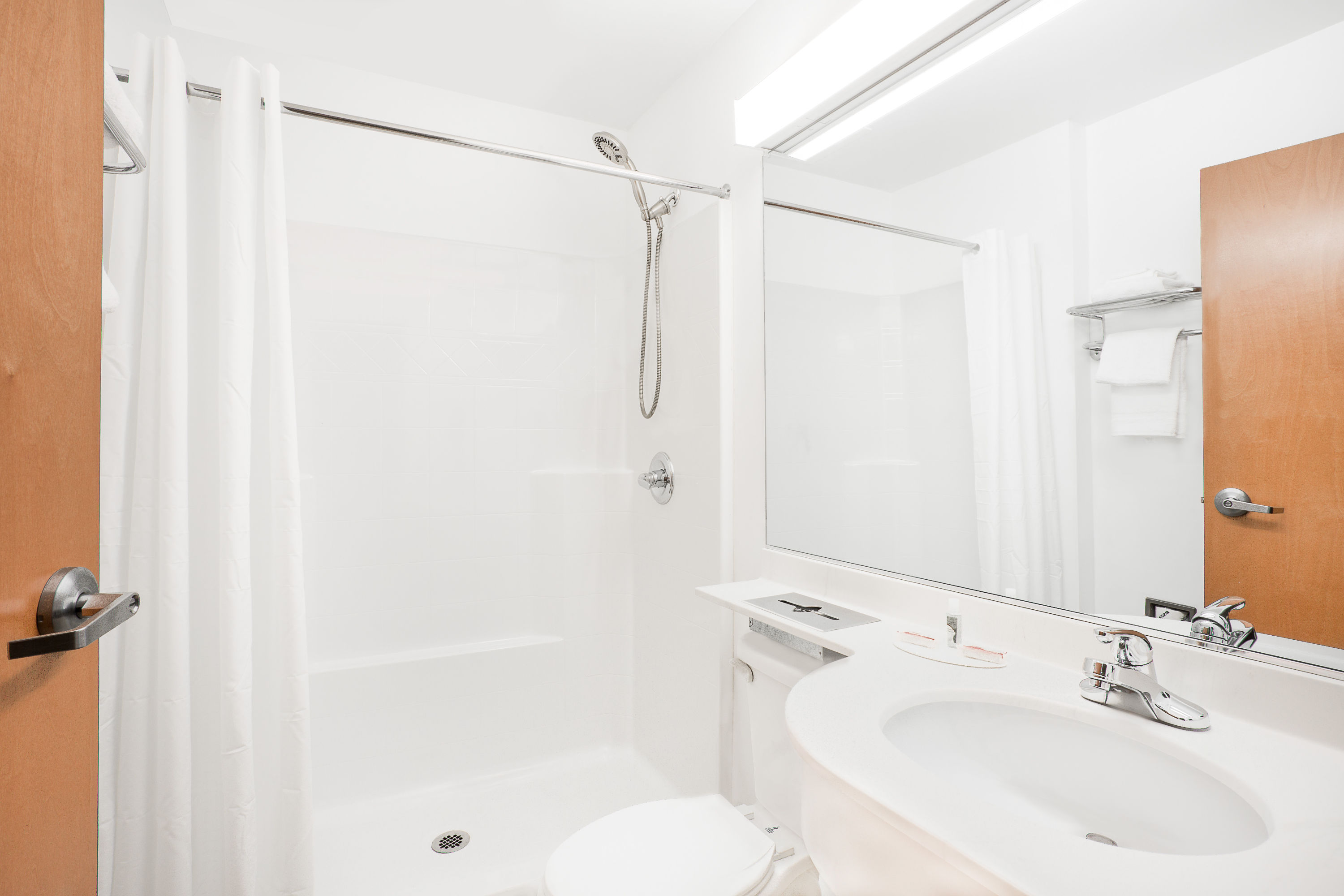 Guest room bath at the Microtel Inn & Suites by Wyndham Beckley East in Beckley, West Virginia