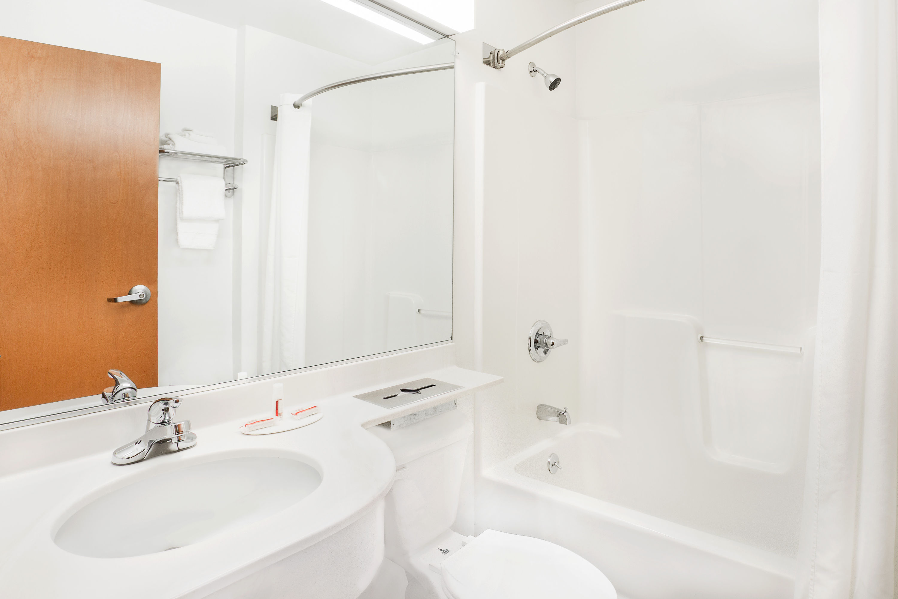 Guest room bath at the Microtel Inn & Suites by Wyndham Beckley East in Beckley, West Virginia