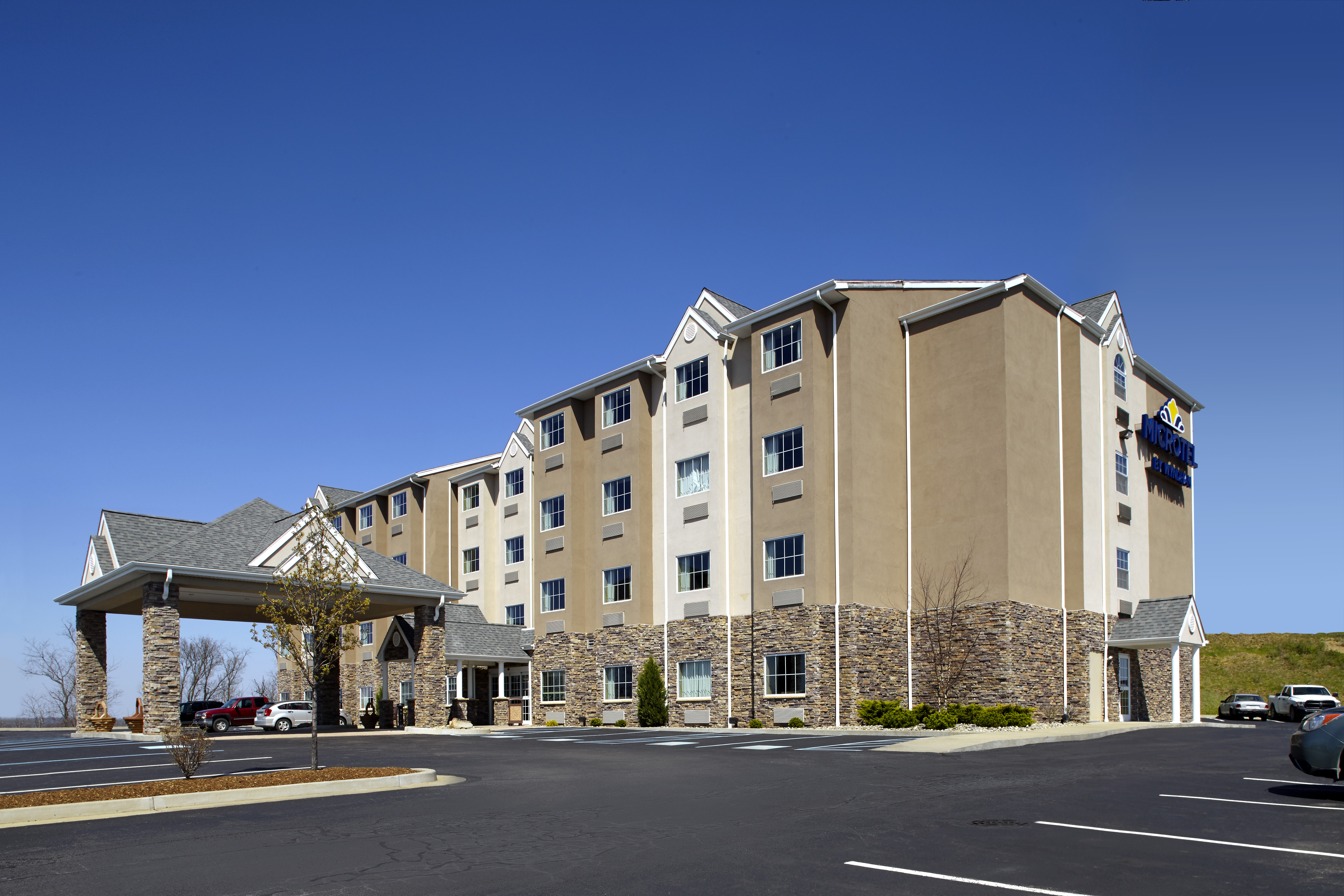 Front Exterior Image of Microtel Inn & Suites by Wyndham Wheeling at The Highlands hotel in Triadelphia, West Virginia