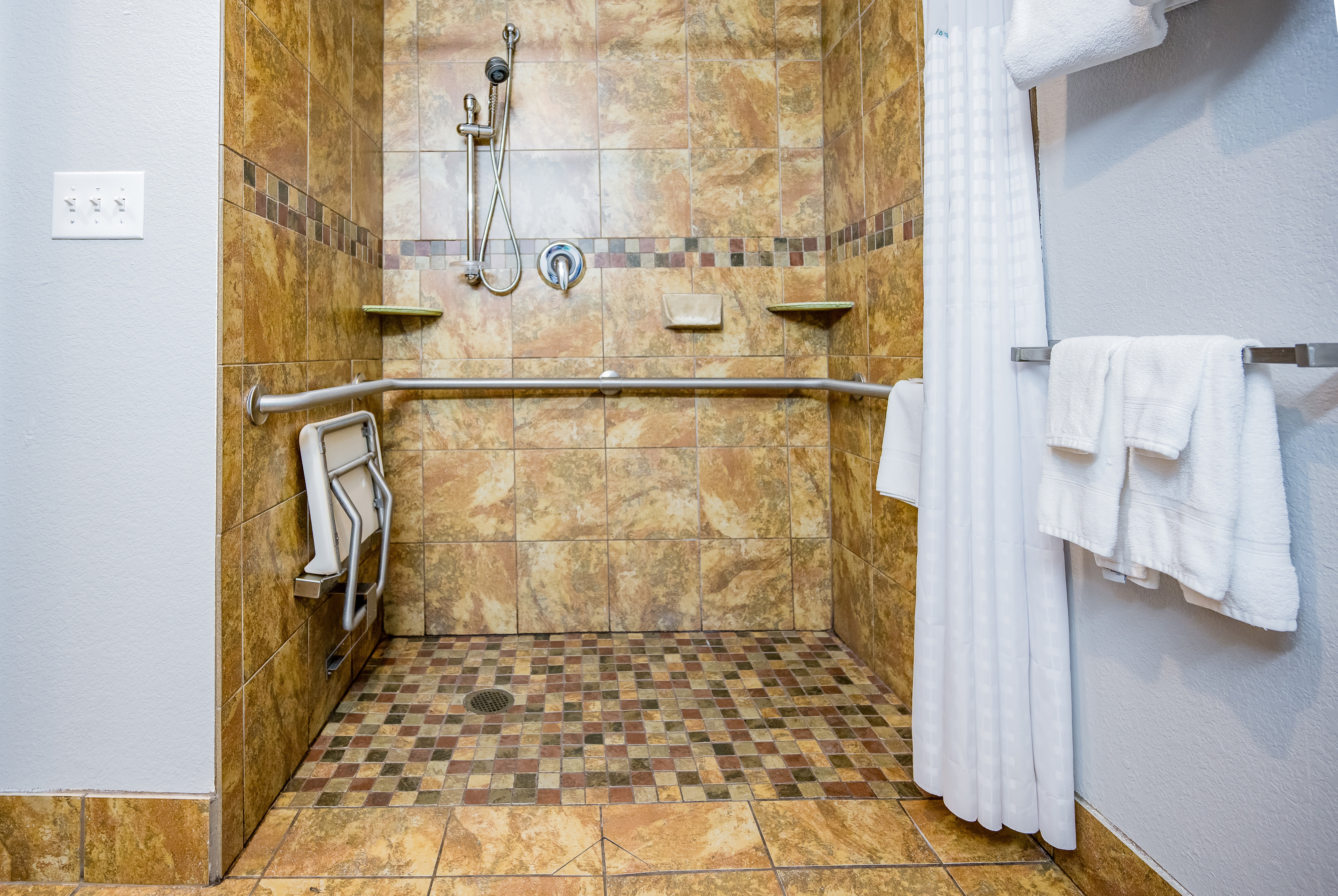 Guest room bath at the Microtel Inn & Suites by Wyndham Cheyenne in Cheyenne, Wyoming