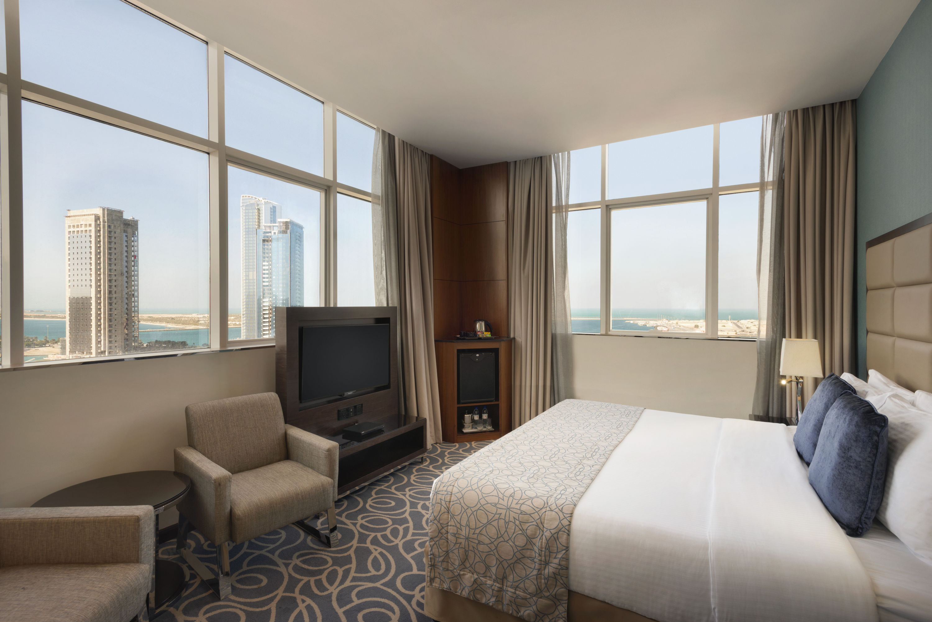 Guest room at the Ramada by Wyndham Abu Dhabi Corniche in Abu Dhabi, Other than US/Canada
