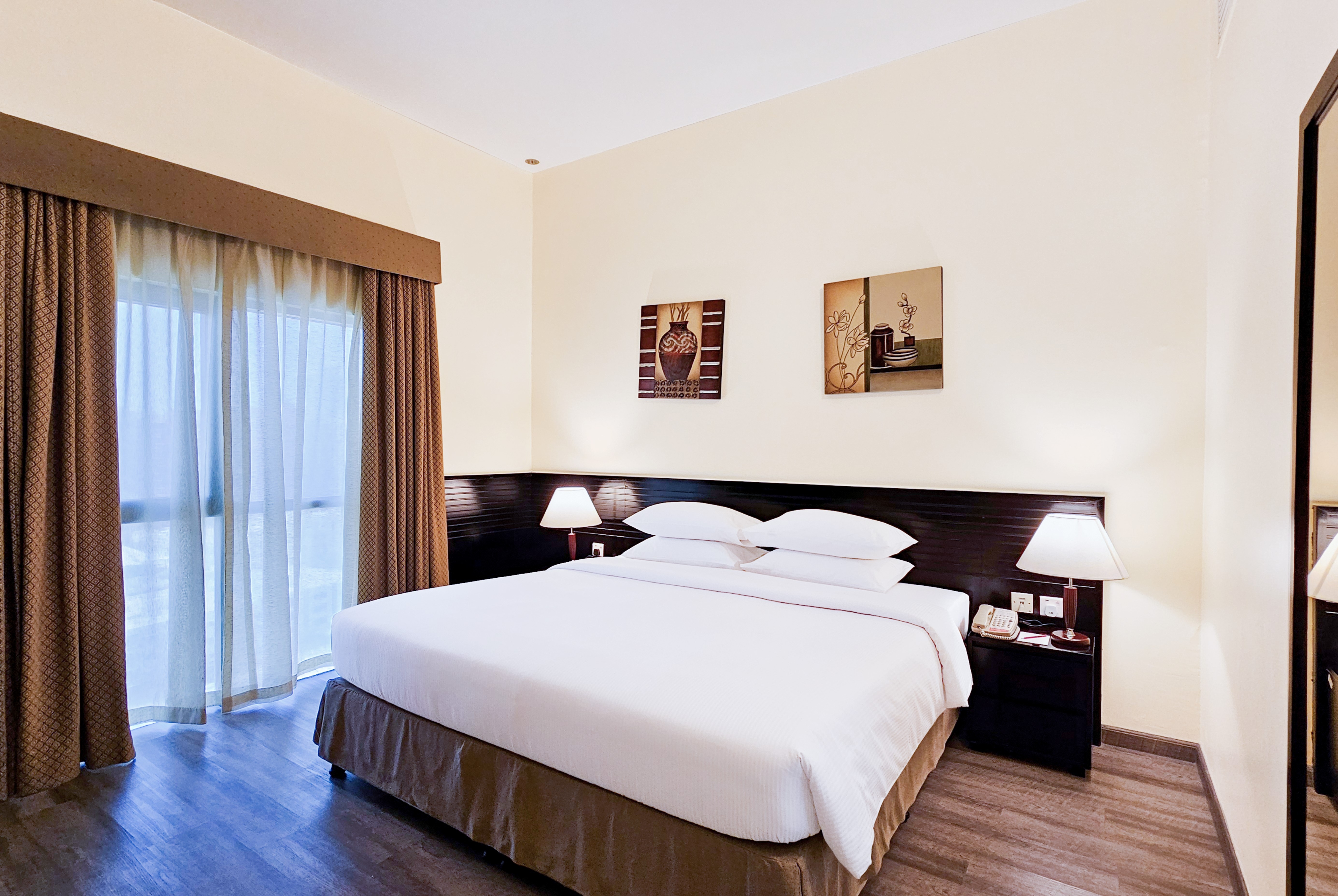 Guest room at the Ramada Hotel & Suites by Wyndham Ajman in Ajman, Other than US/Canada