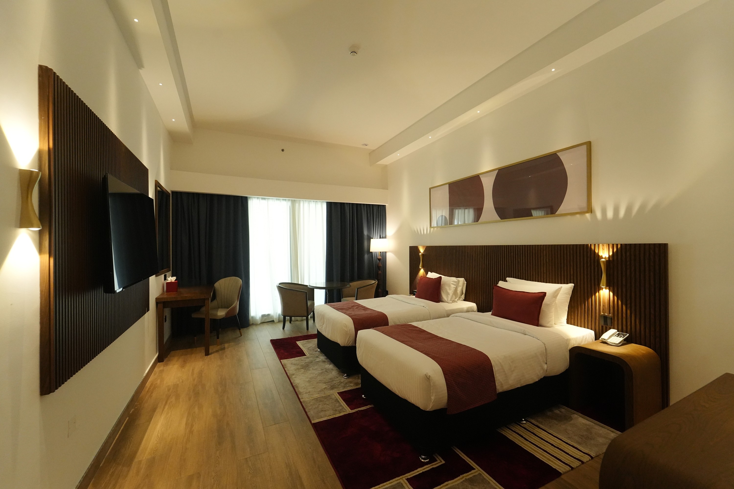 Guest room at the Ramada by Wyndham Abu Dhabi Al Sharia in Al Rahbah, Other than US/Canada