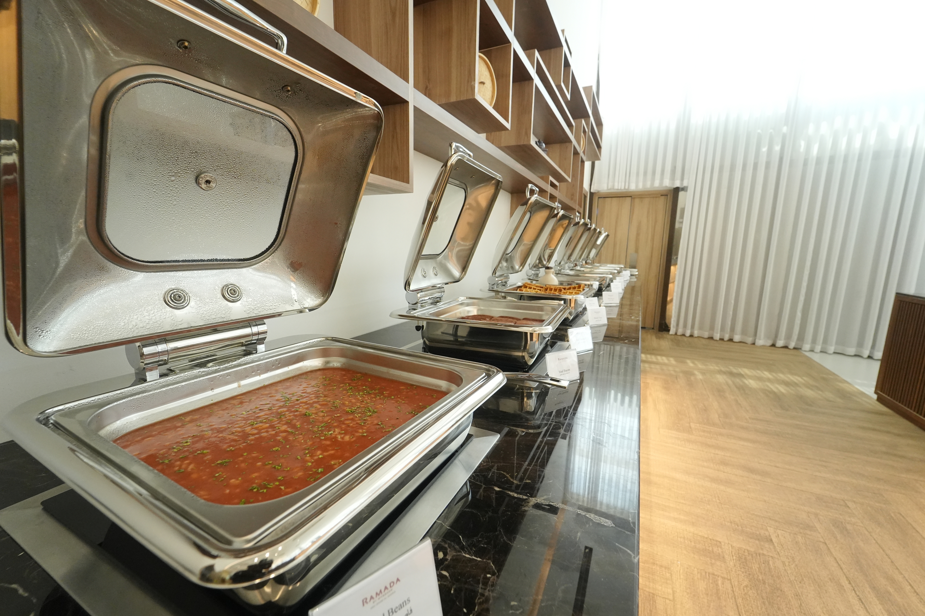 Ramada by Wyndham Abu Dhabi Al Sharia restaurant in Al Rahbah, Other than US/Canada