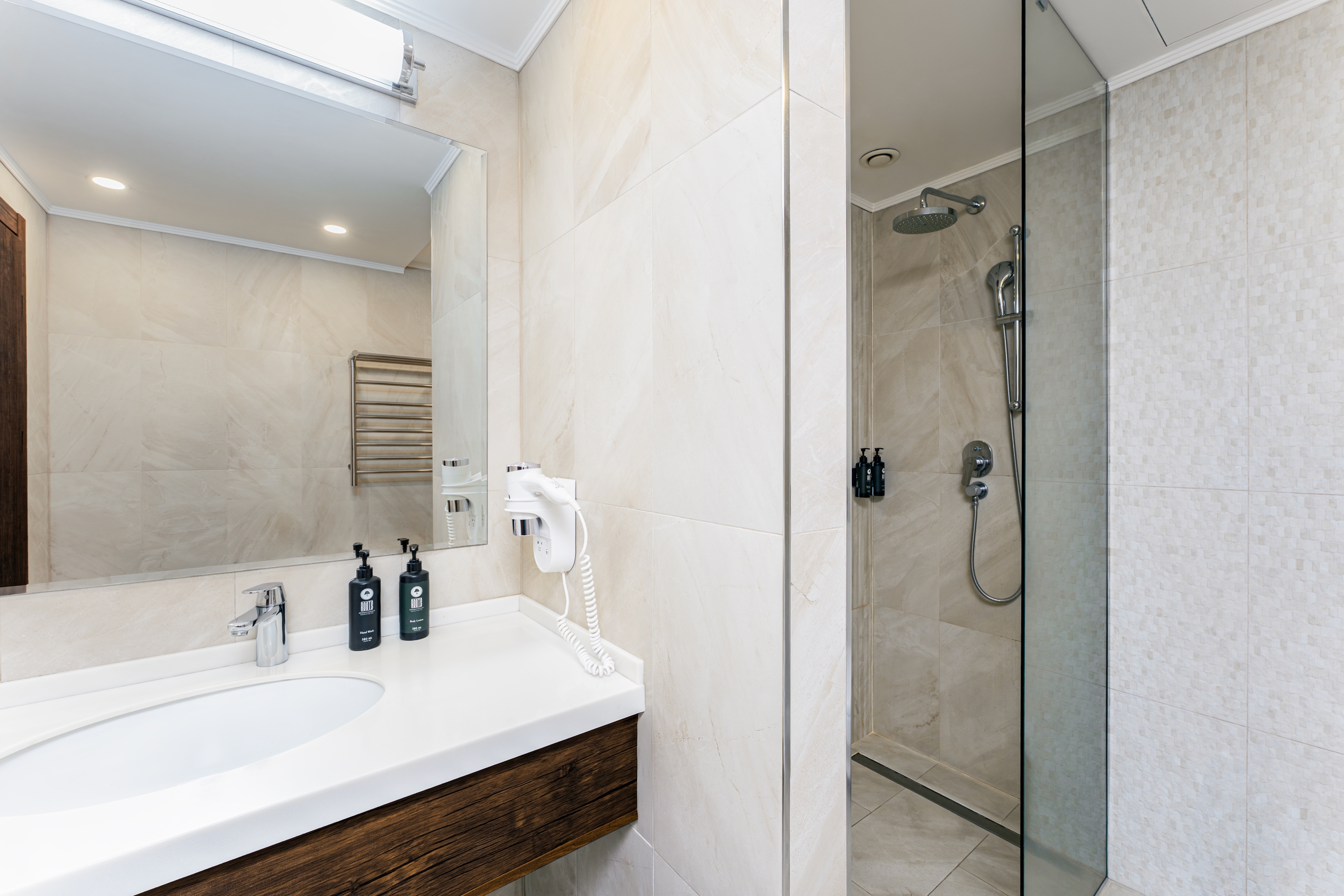 Guest room bath at the Ramada Hotel & Suites by Wyndham Yerevan in Yerevan, Other than US/Canada