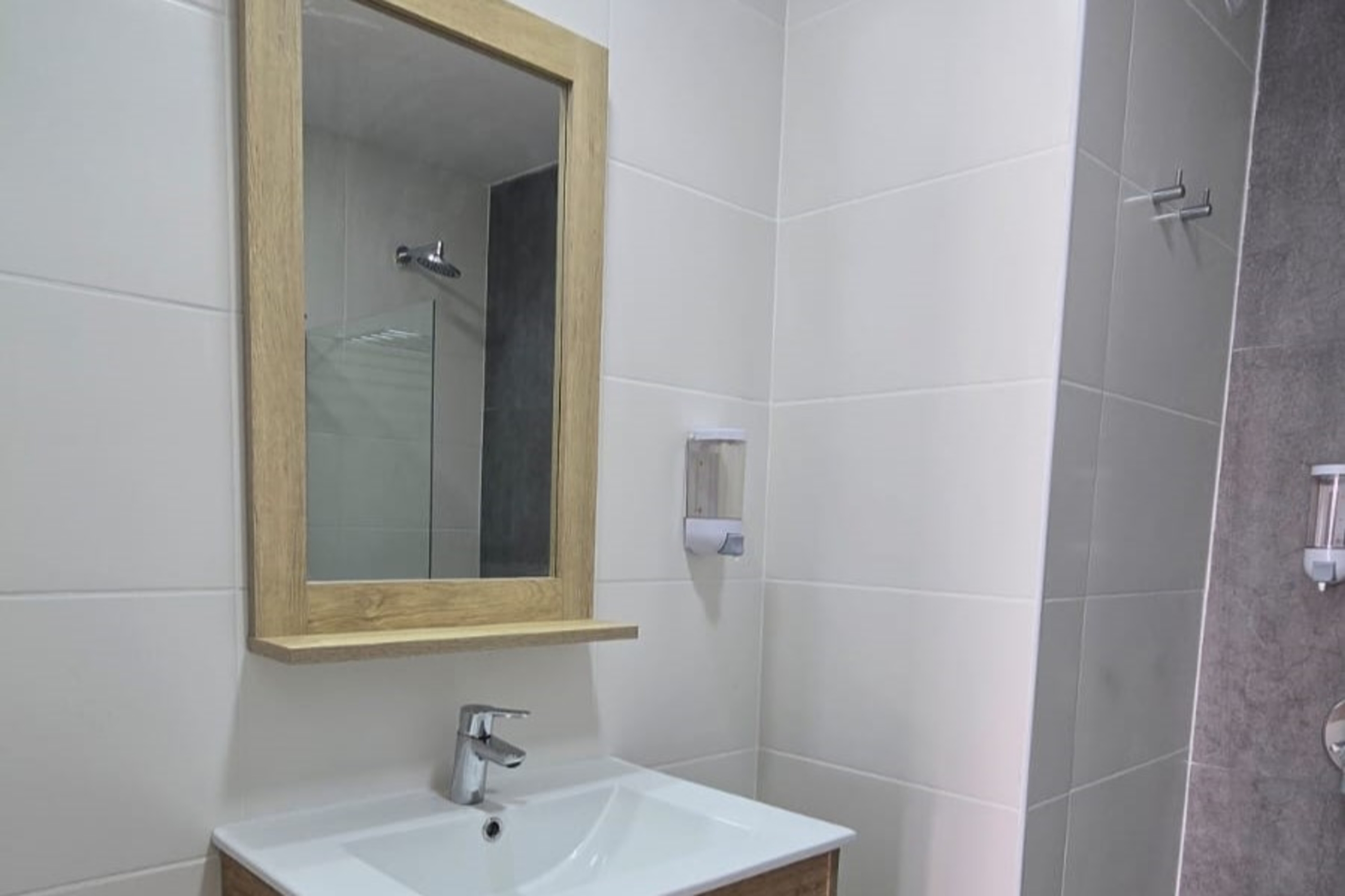 Guest room bath at the Ramada Residences by Wyndham Puerto Madryn CQ Gales in Puerto Madryn, Other than US/Canada