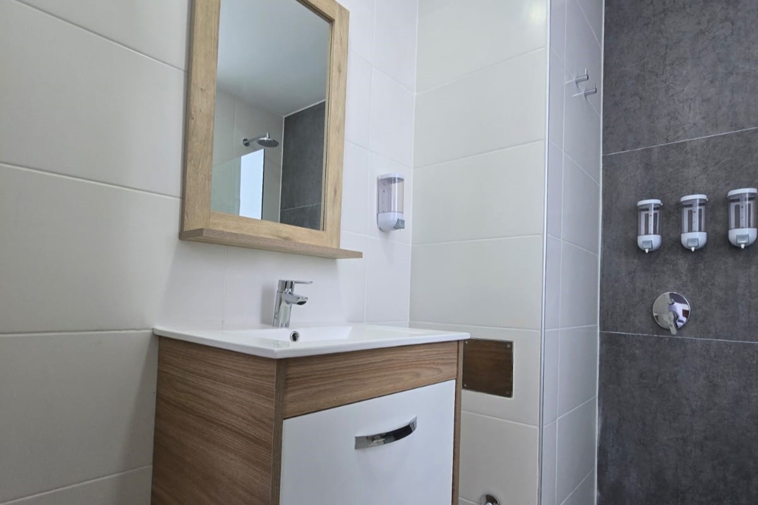 Guest room bath at the Ramada Residences by Wyndham Puerto Madryn CQ Gales in Puerto Madryn, Other than US/Canada