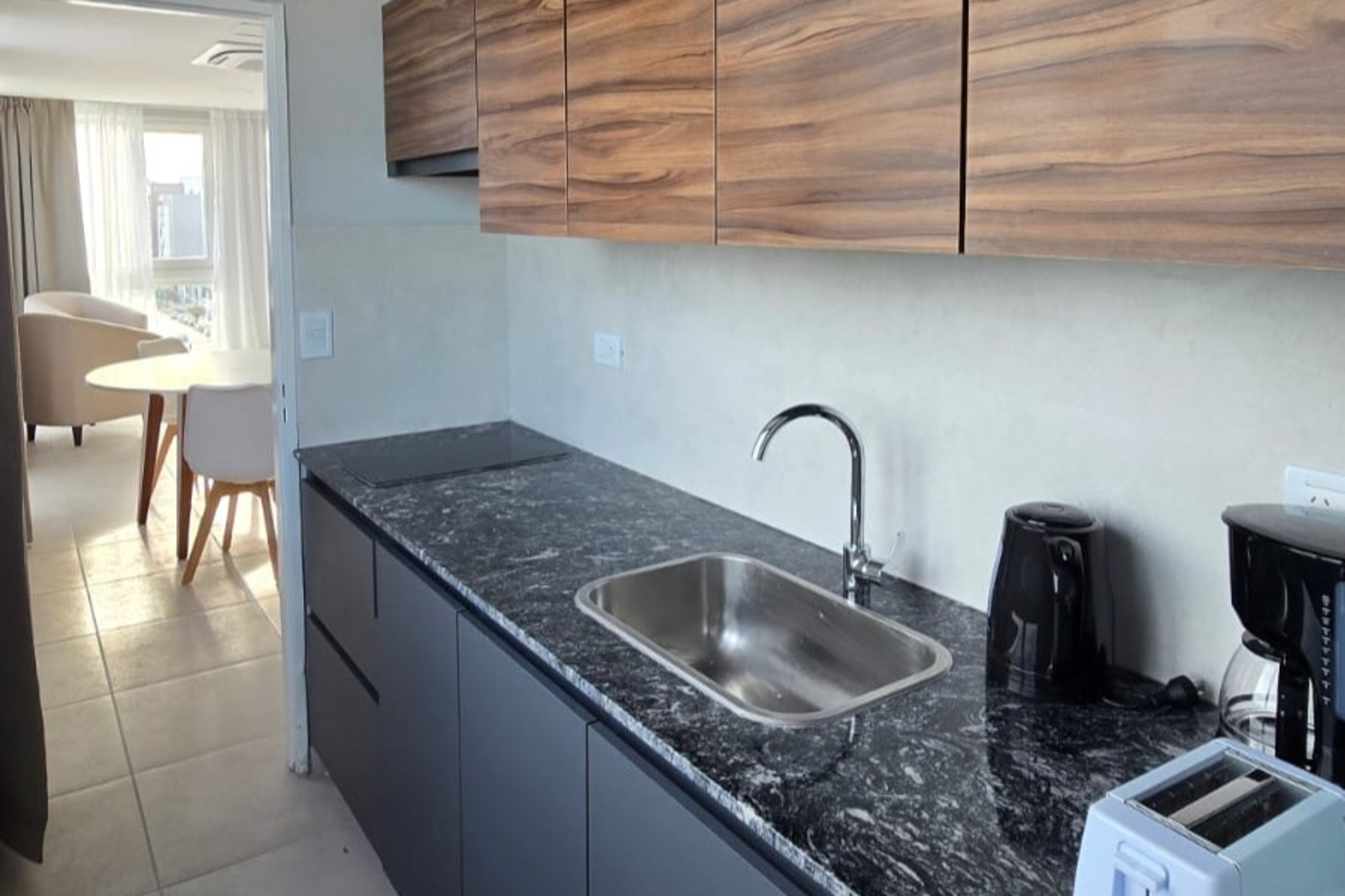 Guest room at the Ramada Residences by Wyndham Puerto Madryn CQ Gales in Puerto Madryn, Other than US/Canada