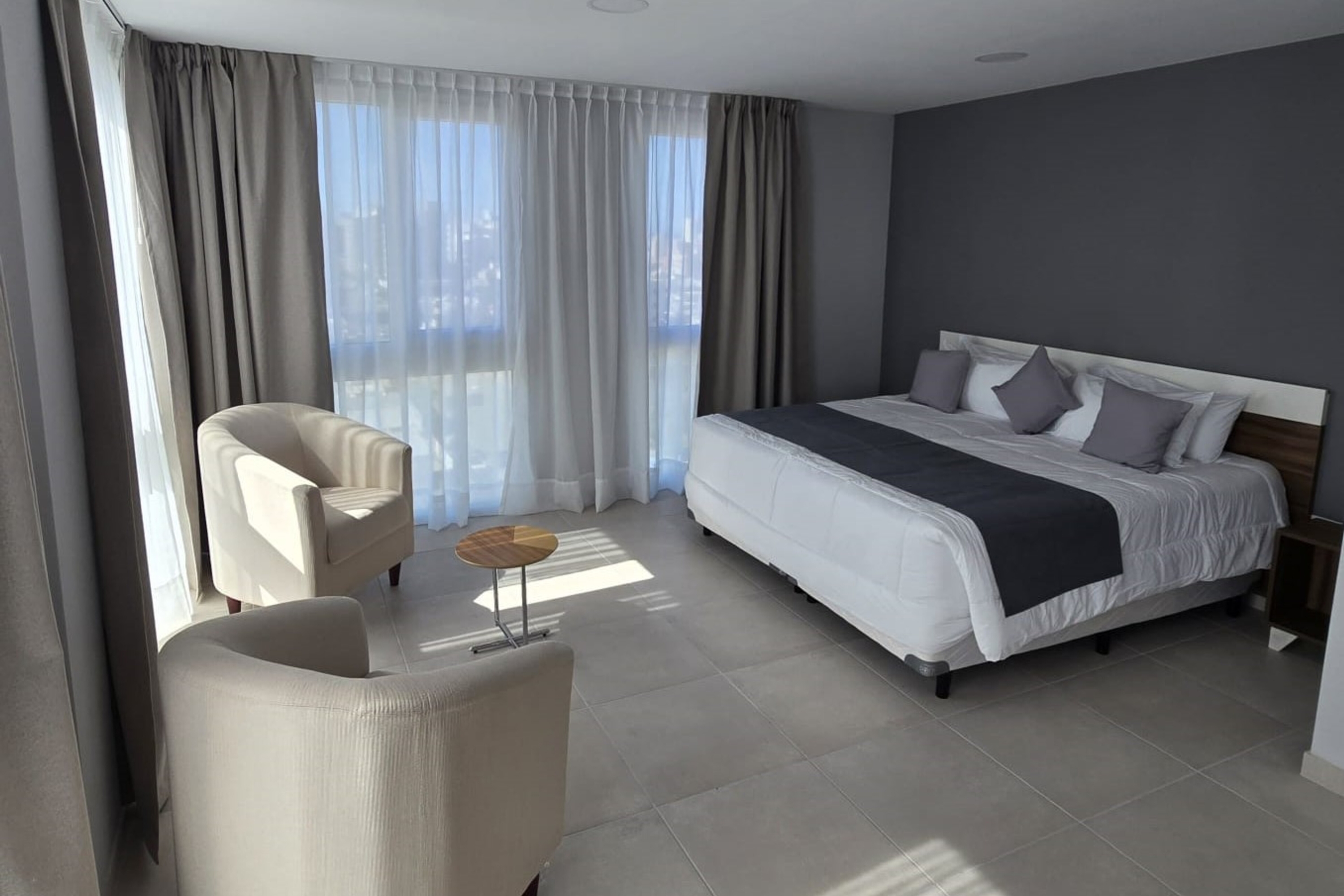 Guest room at the Ramada Residences by Wyndham Puerto Madryn CQ Gales in Puerto Madryn, Other than US/Canada