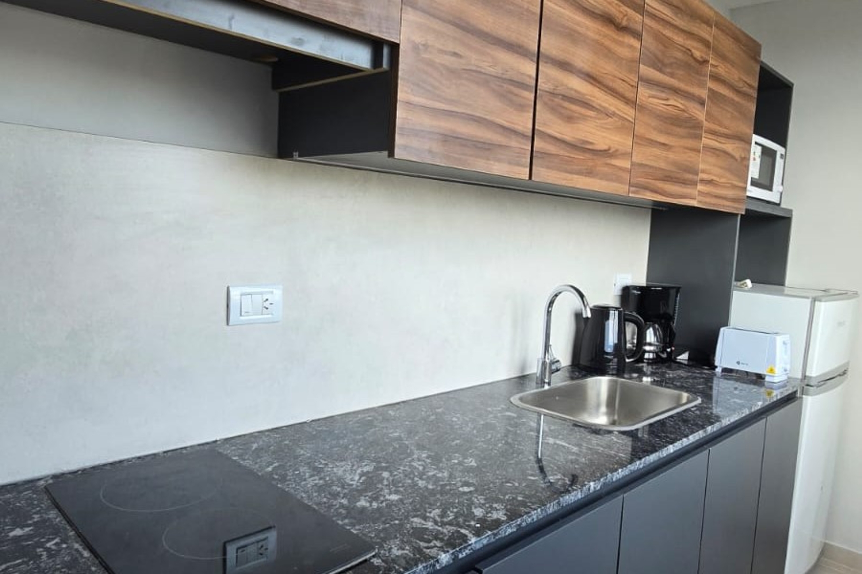 Guest room at the Ramada Residences by Wyndham Puerto Madryn CQ Gales in Puerto Madryn, Other than US/Canada