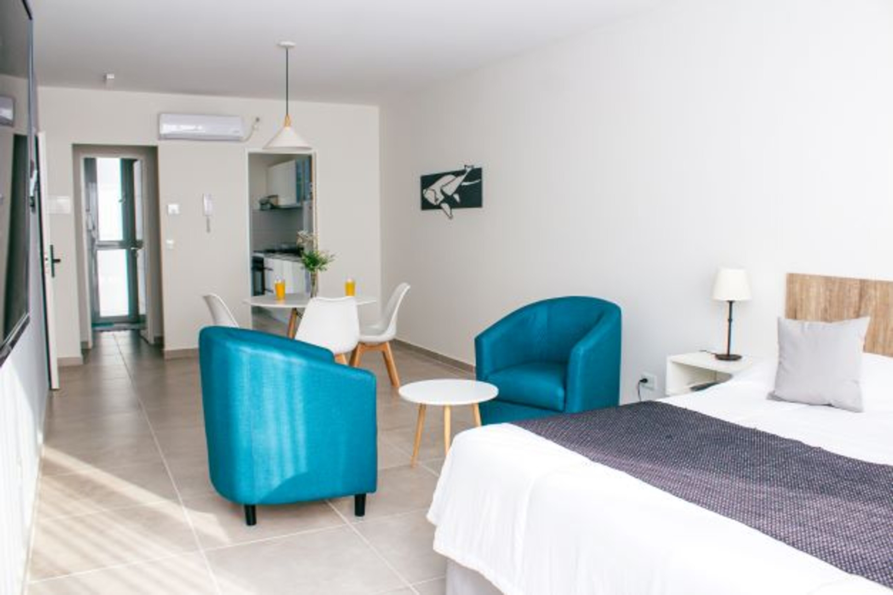 Guest room at the Ramada Residences by Wyndham Puerto Madryn CQ Mitre in Puerto Madryn, Other than US/Canada