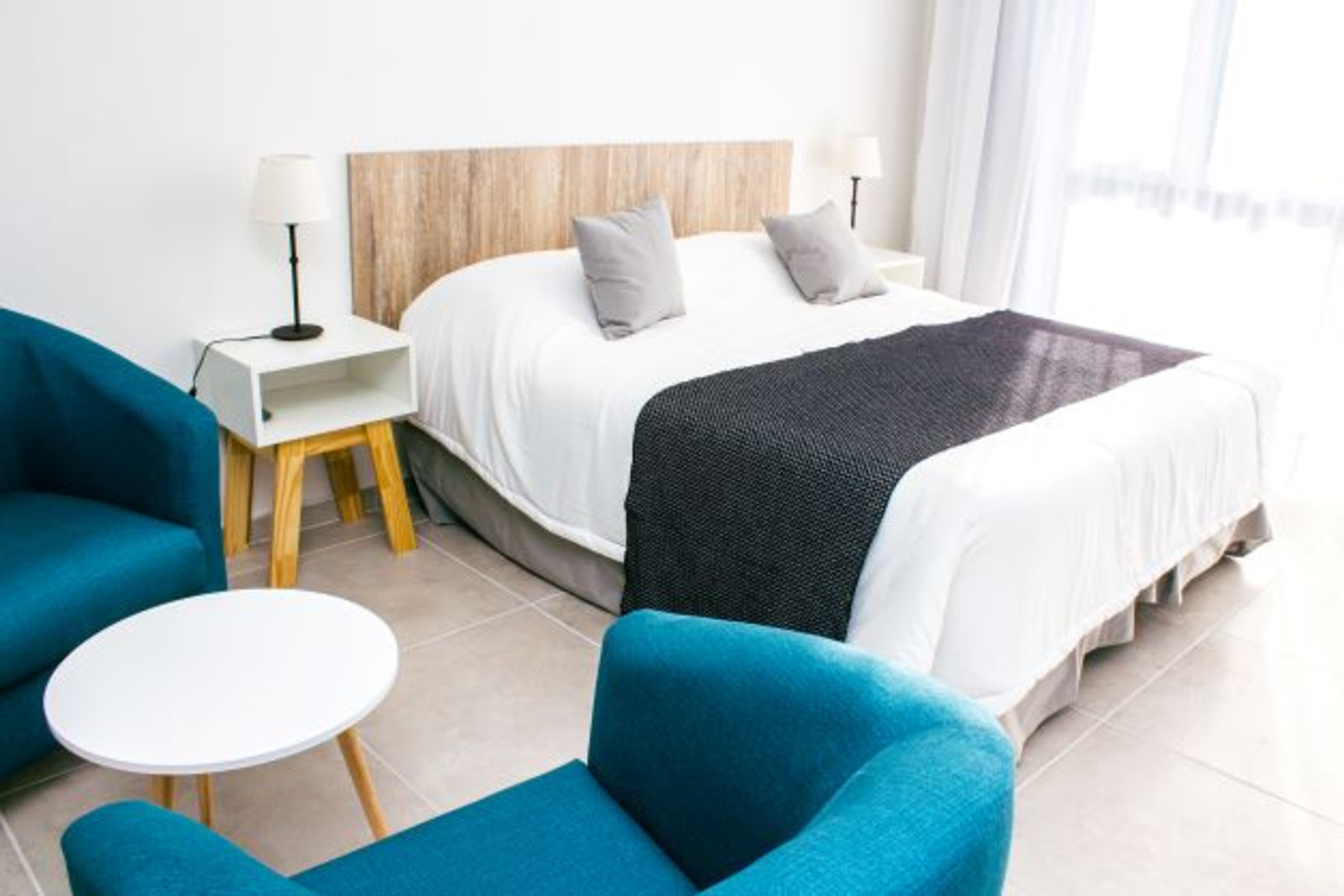 Guest room at the Ramada Residences by Wyndham Puerto Madryn CQ Mitre in Puerto Madryn, Other than US/Canada