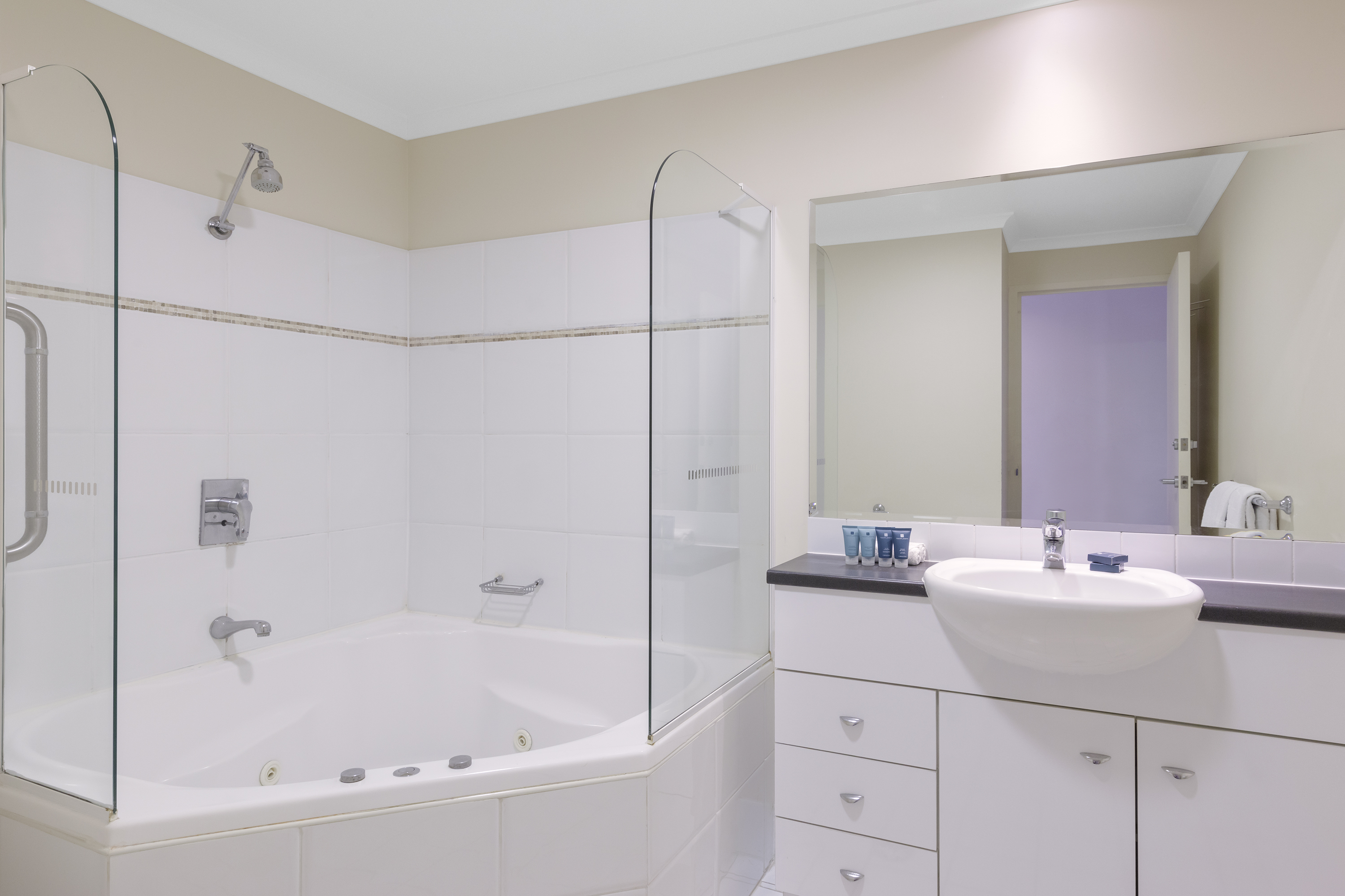 Guest room bath at the Ramada Resort by Wyndham Shoal Bay in Shoal Bay, Other than US/Canada