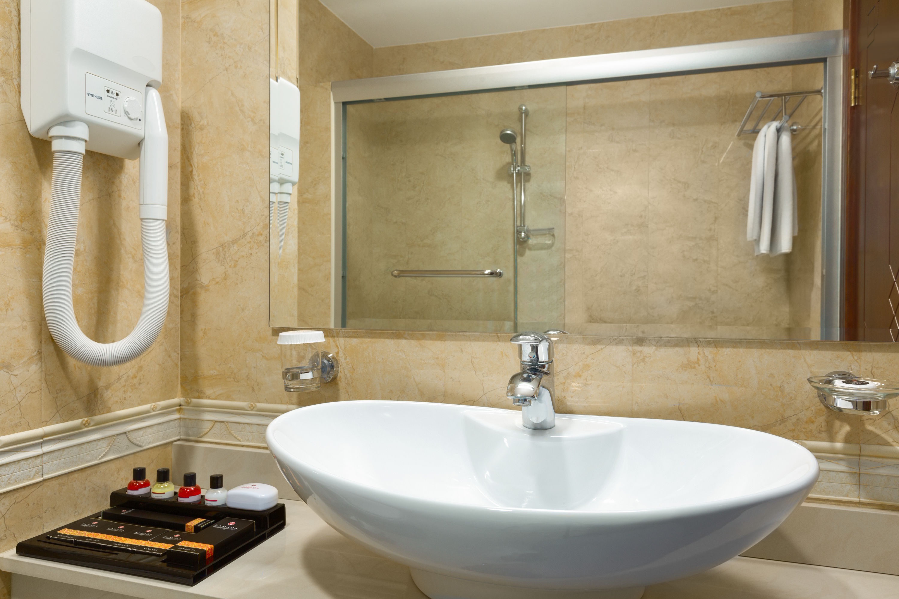Guest room bath at the Ramada Plaza by Wyndham Gence in Gence, Other than US/Canada