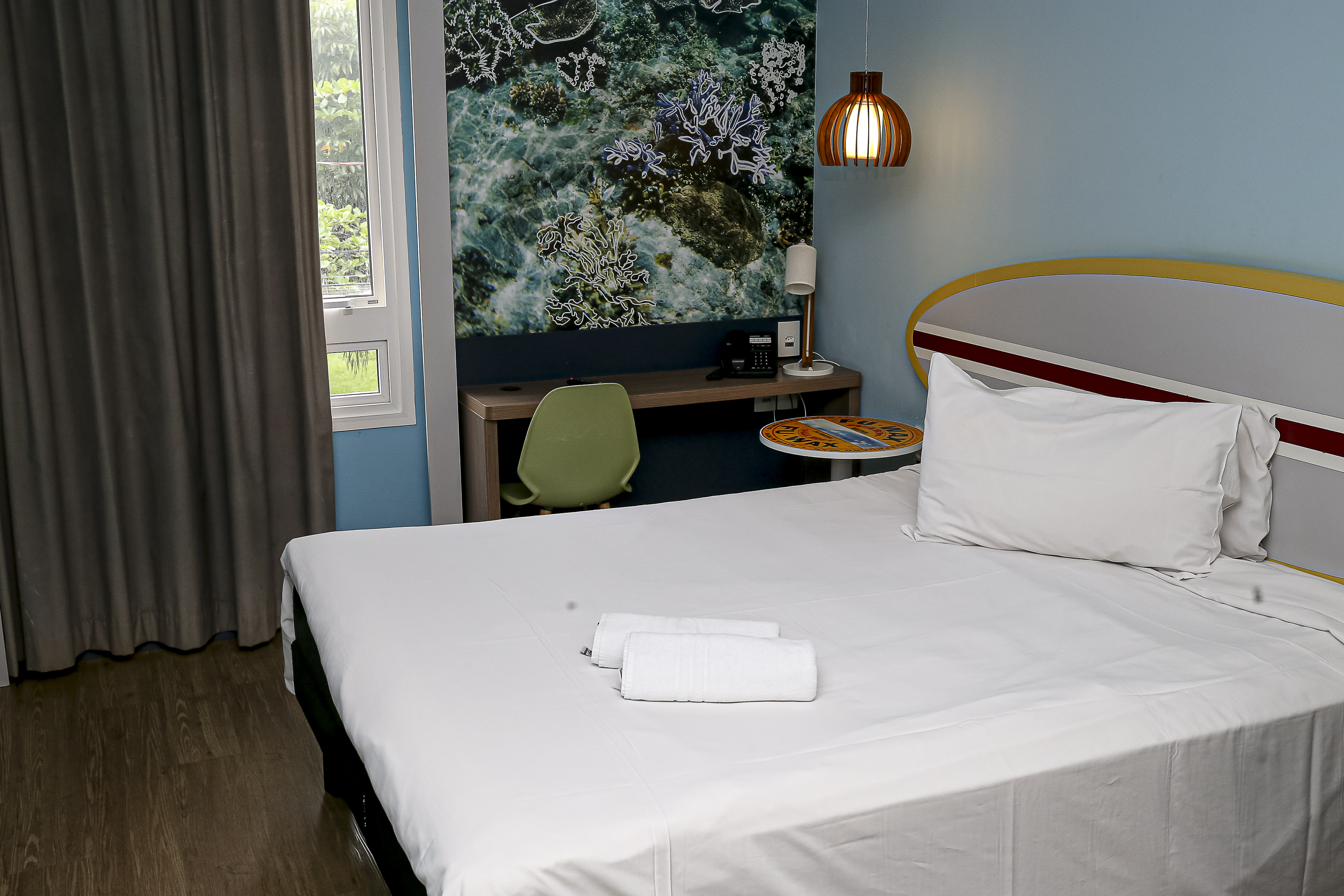 Guest room at the Ramada Encore by Wyndham Guaruja Praia in Guaruja, Other than US/Canada