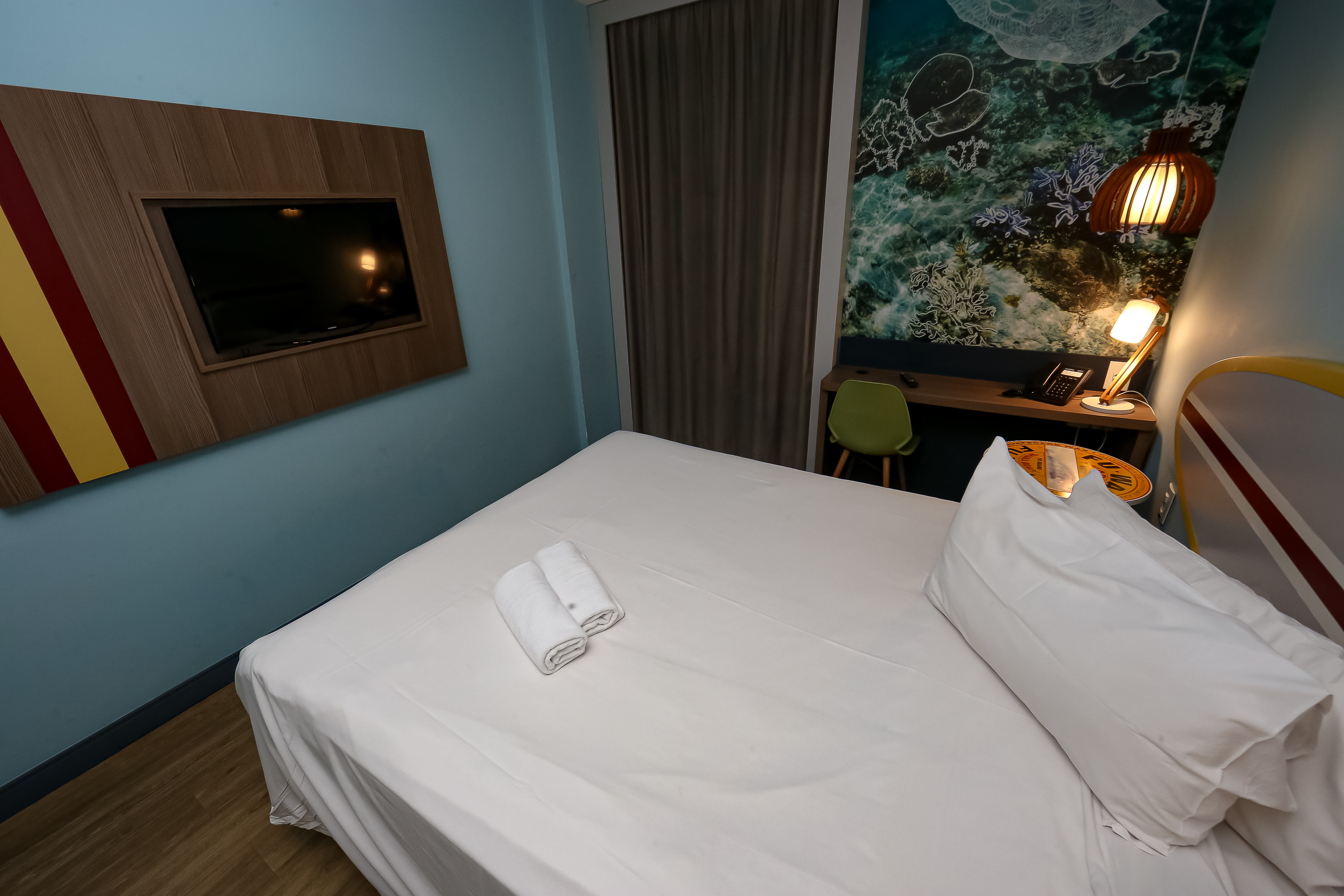 Guest room at the Ramada Encore by Wyndham Guaruja Praia in Guaruja, Other than US/Canada