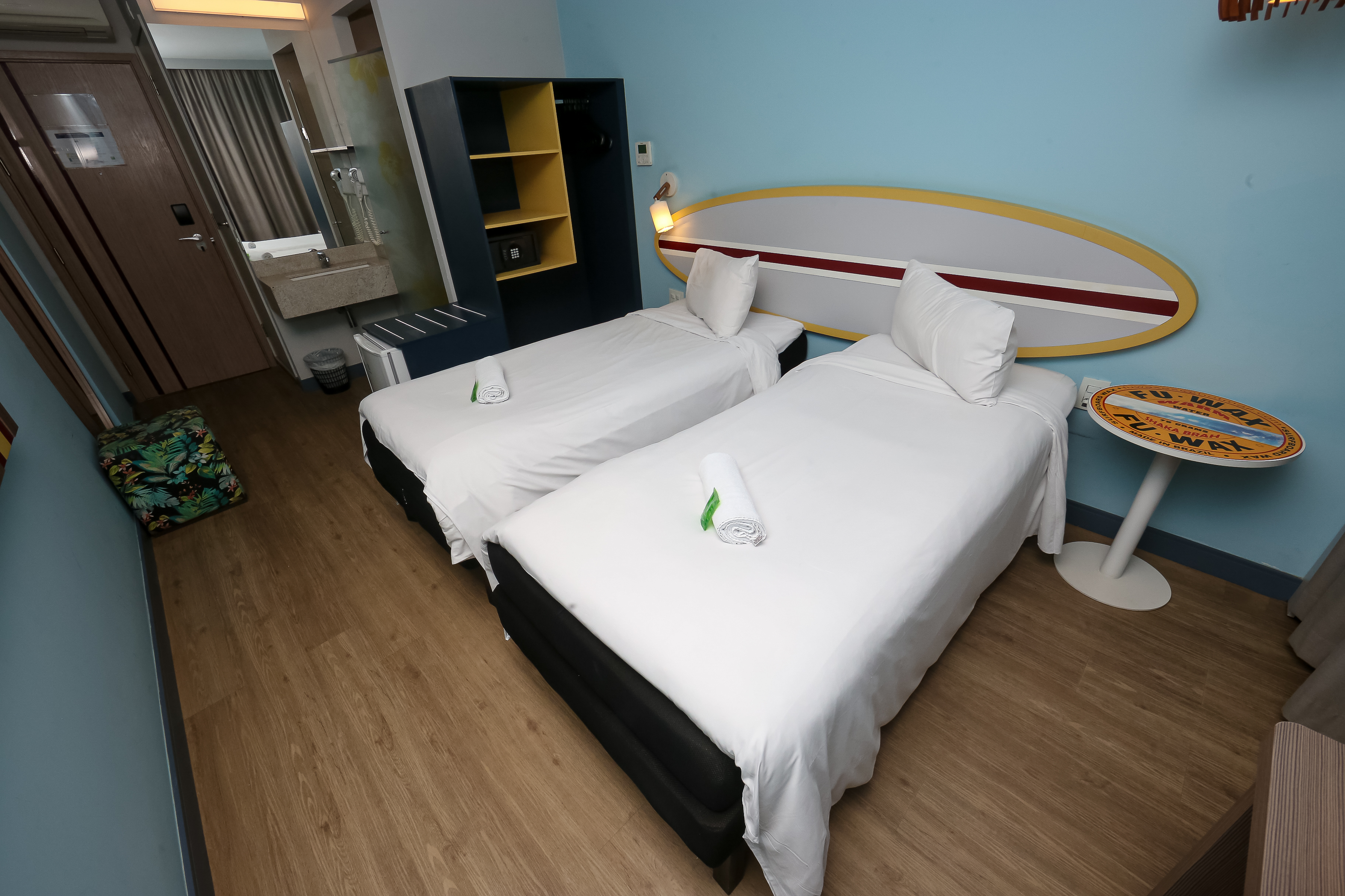 Guest room at the Ramada Encore by Wyndham Guaruja Praia in Guaruja, Other than US/Canada