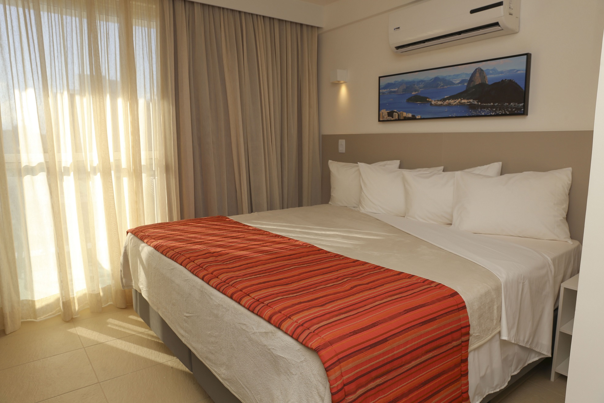 Guest room at the Ramada by Wyndham Macae Hotel & Suites in Macae, Other than US/Canada