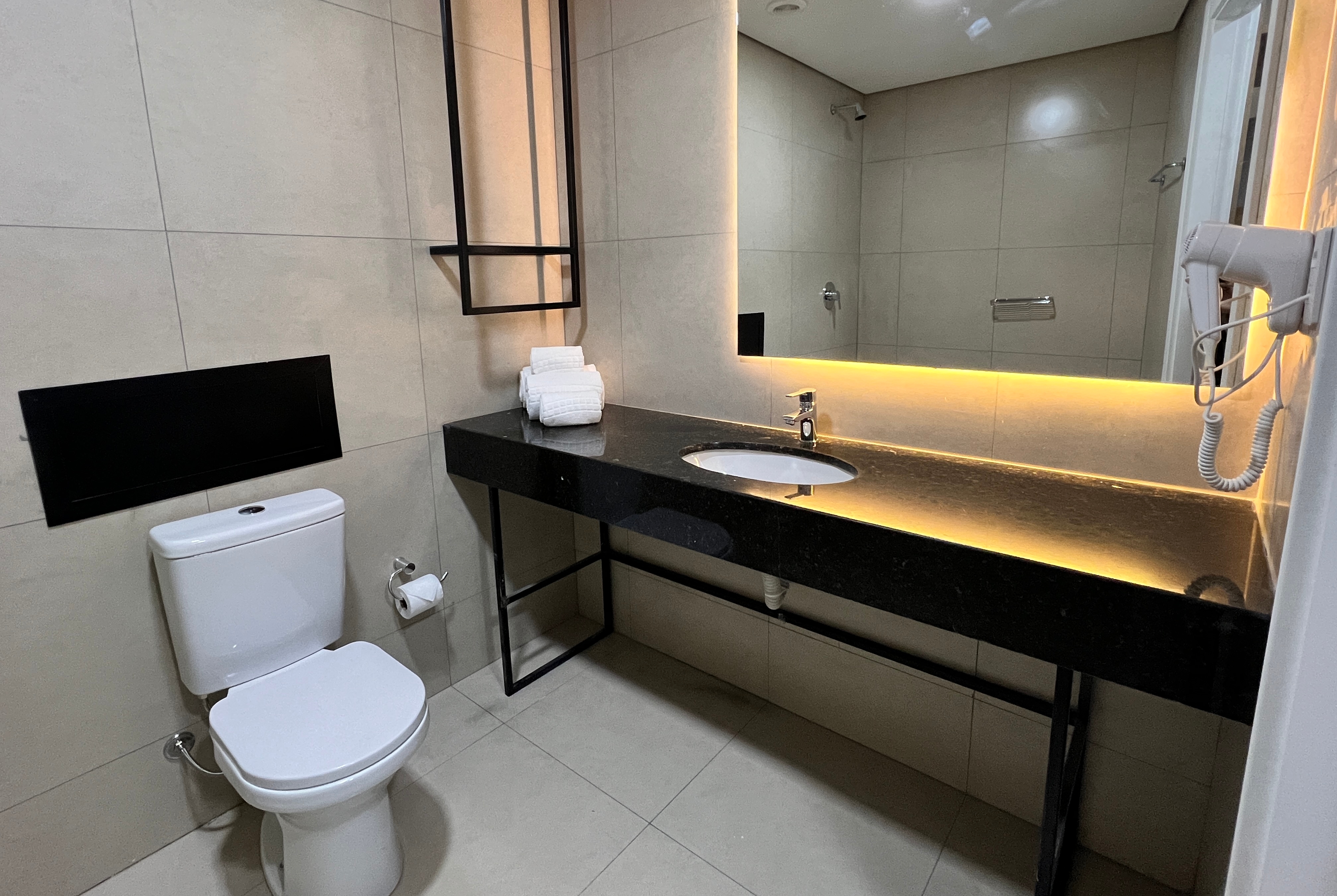 Guest room at the Ramada Encore by Wyndham Ponta Grossa in Ponta Grossa, Other than US/Canada