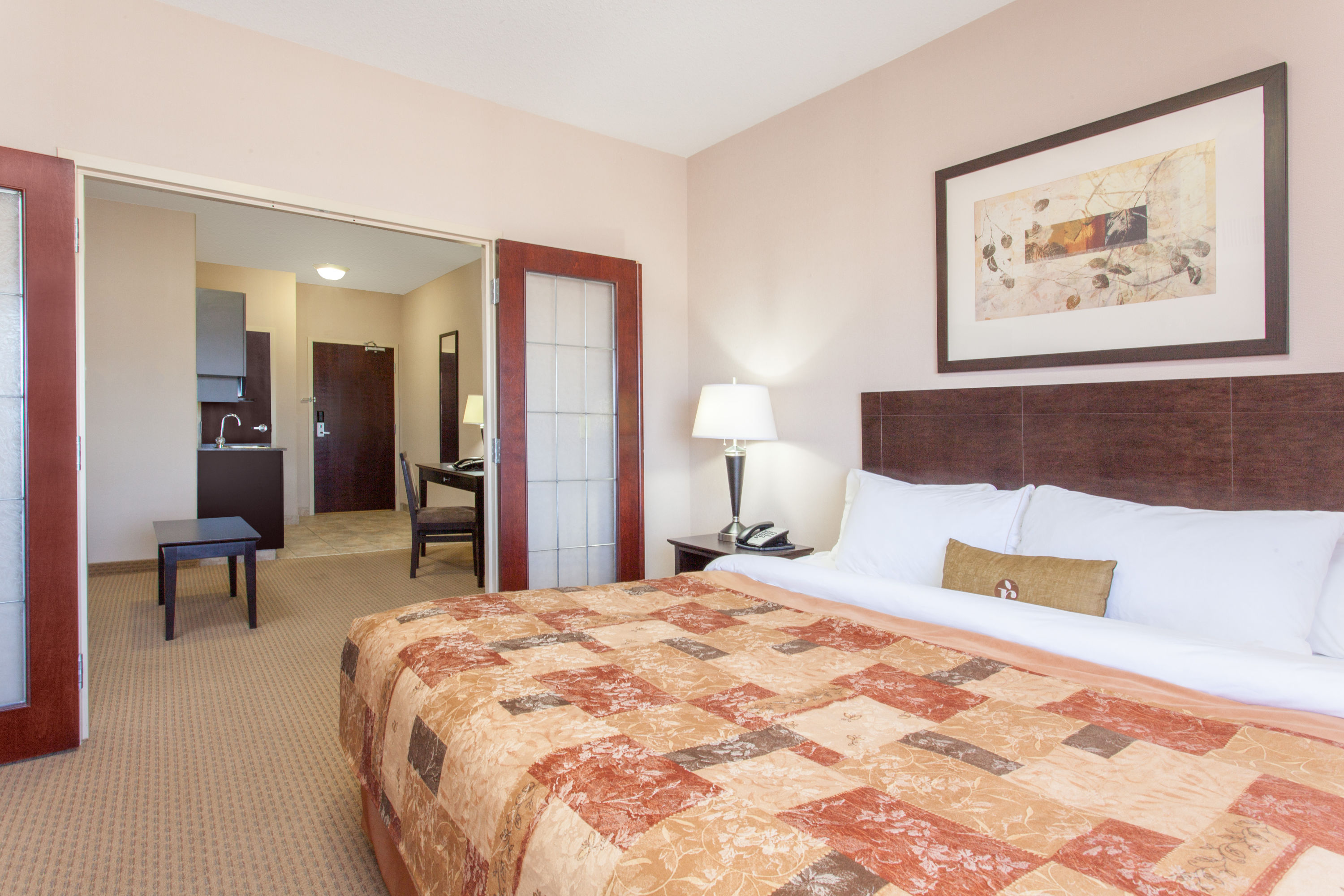 Guest room at the Ramada by Wyndham Brooks in Brooks, Alberta