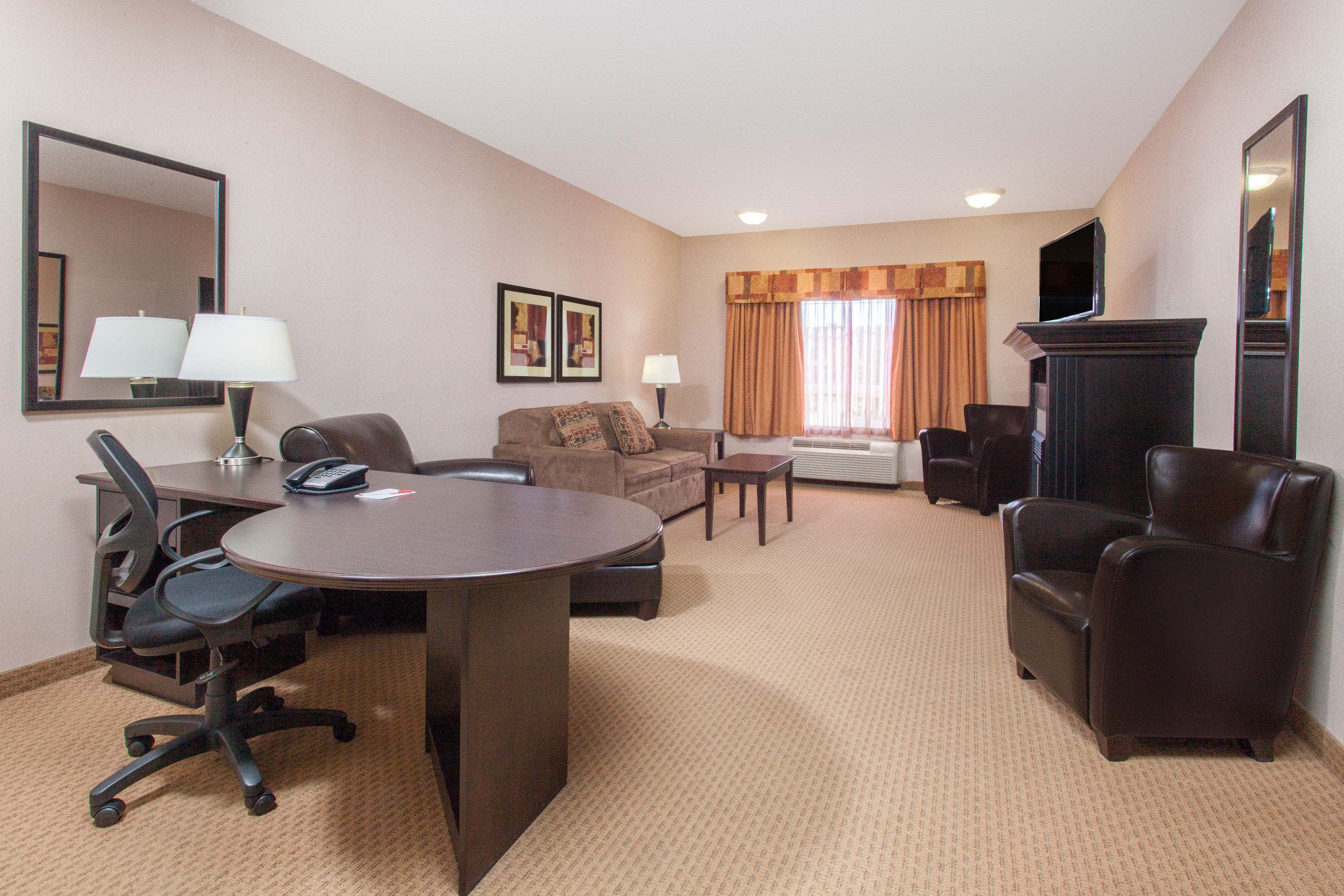 Guest room at the Ramada by Wyndham Brooks in Brooks, Alberta