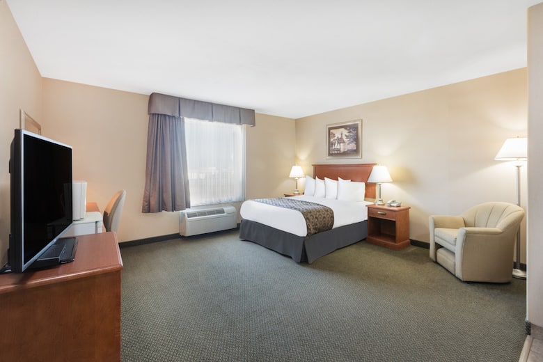 Guest room at the Ramada Clairmont/Grande Prairie in Clairmont, Alberta