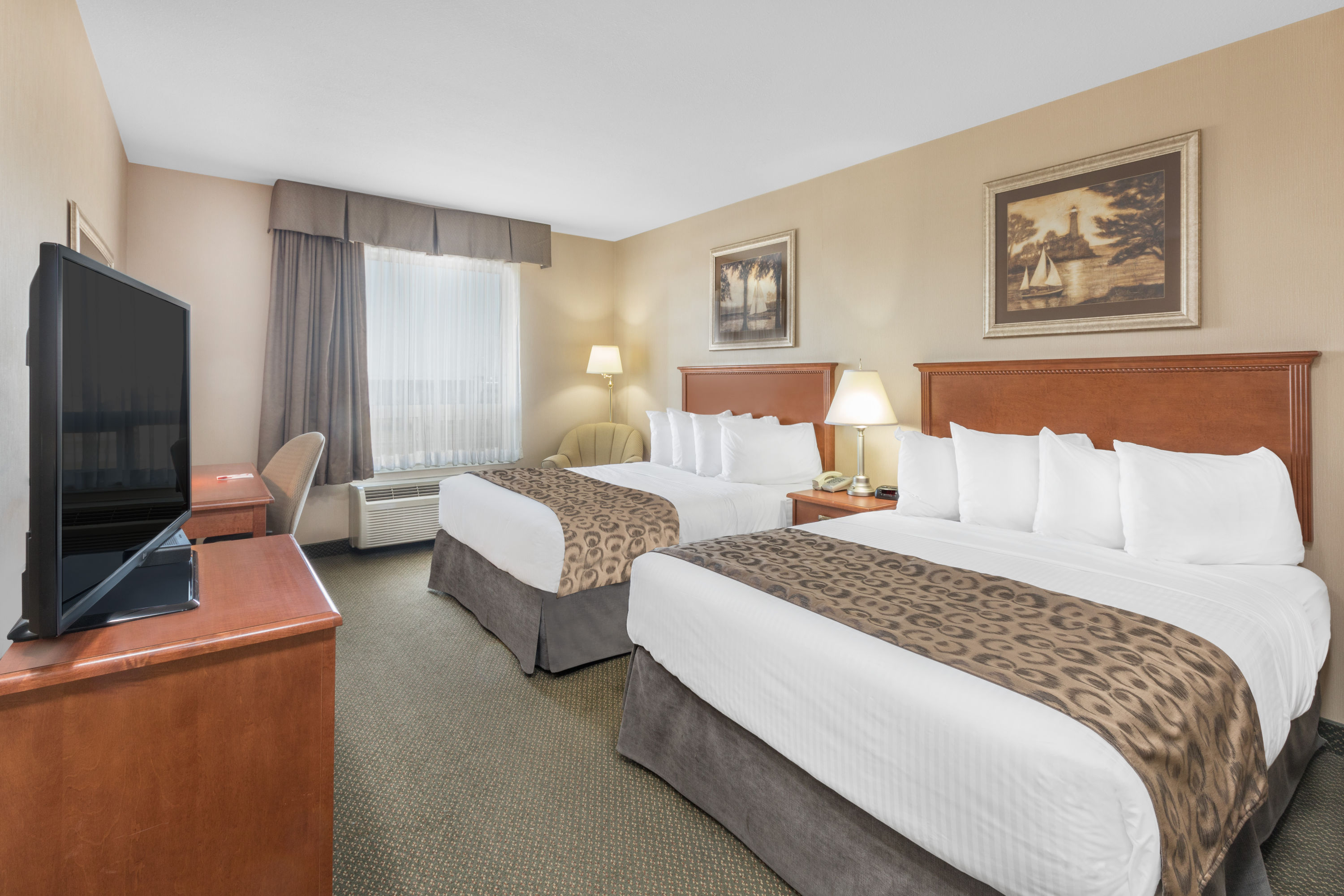 Guest room at the Ramada by Wyndham Clairmont/Grande Prairie in Clairmont, Alberta