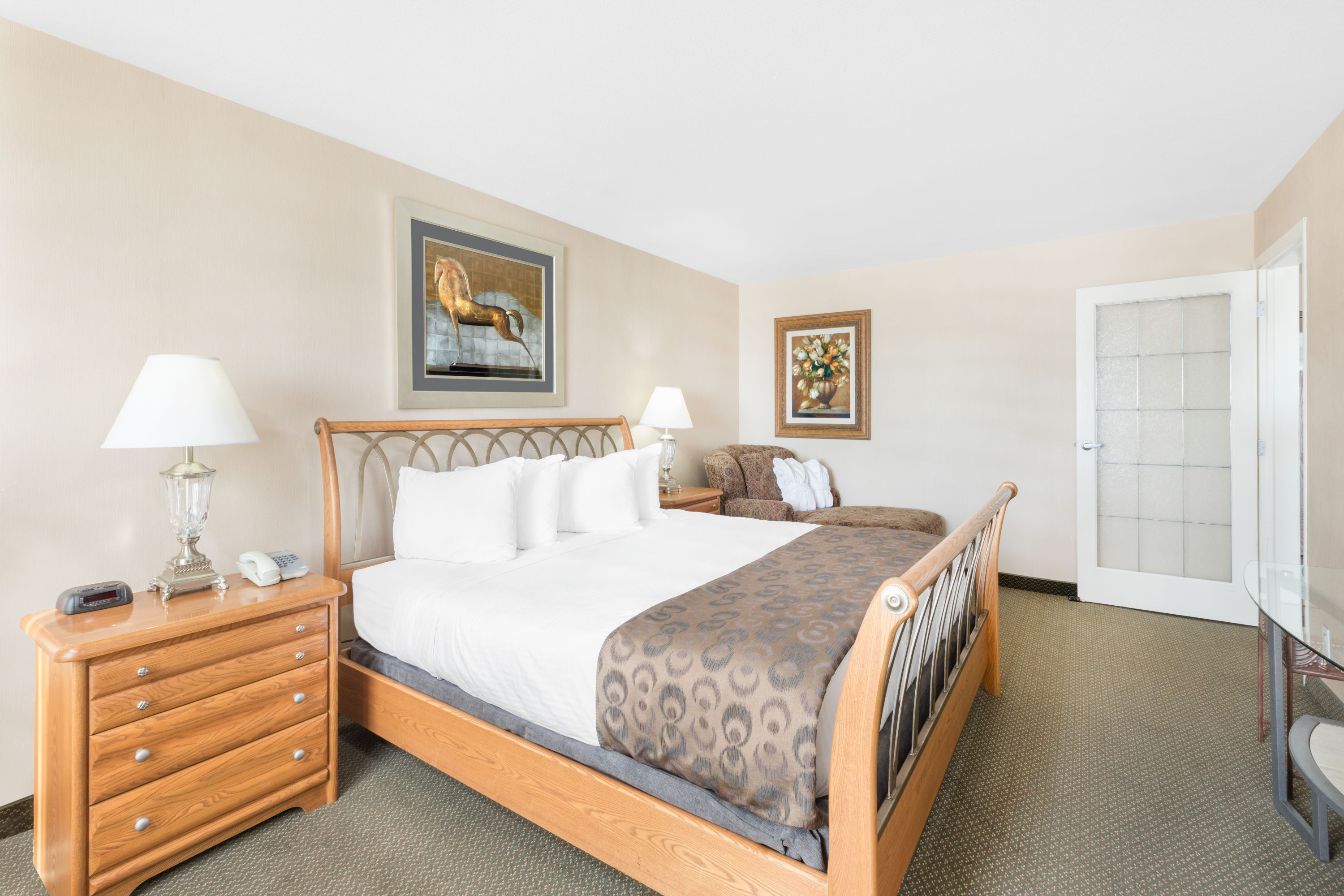Guest room at the Ramada by Wyndham Clairmont/Grande Prairie in Clairmont, Alberta