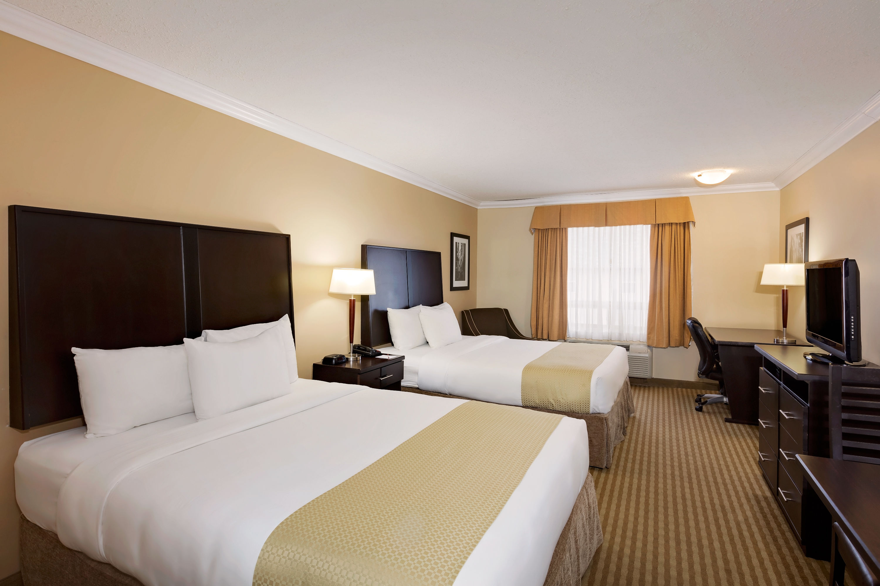 Guest room at the Ramada by Wyndham Cold Lake in Cold Lake, Alberta