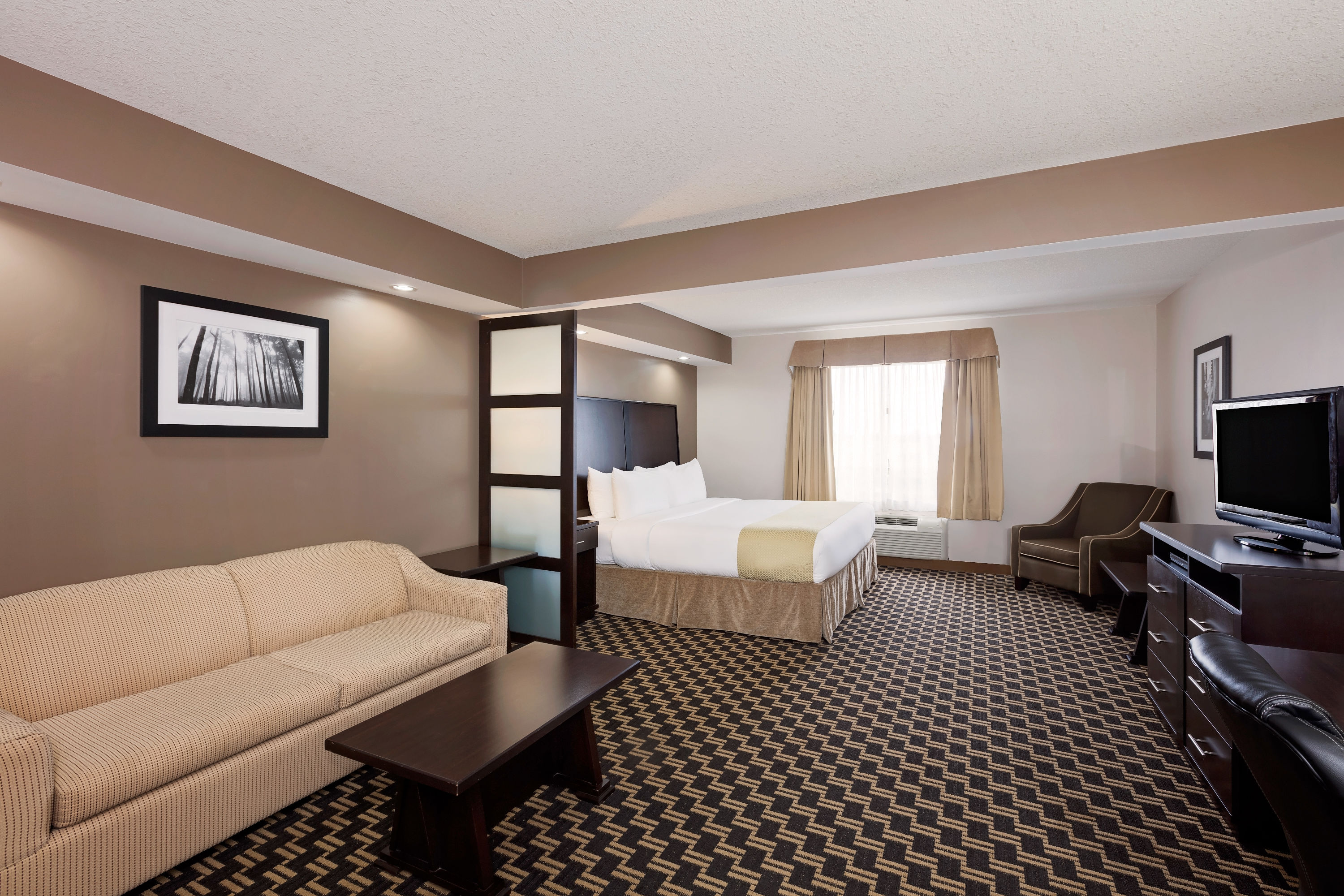 Guest room at the Ramada by Wyndham Cold Lake in Cold Lake, Alberta