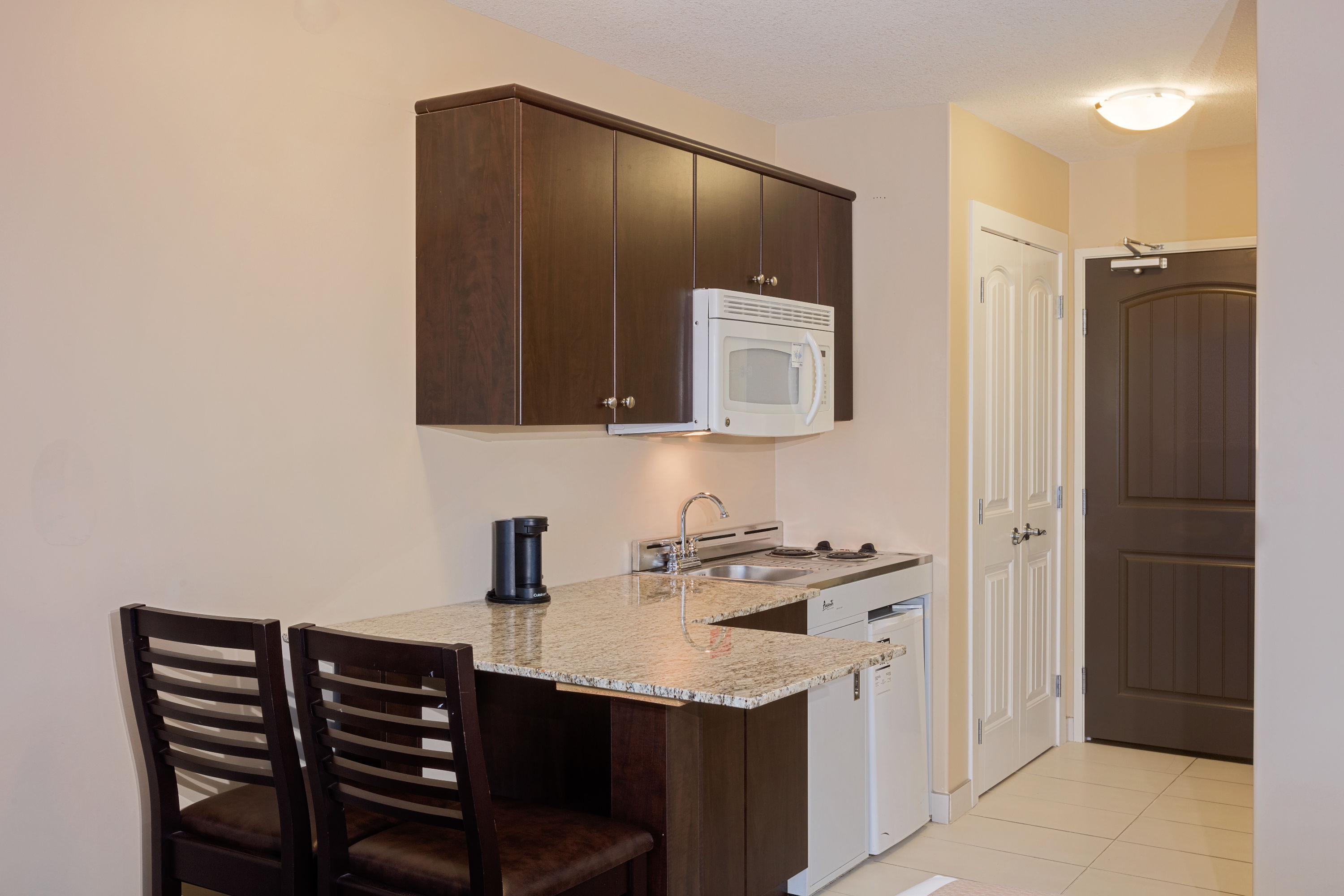 Guest room at the Ramada by Wyndham Cold Lake in Cold Lake, Alberta