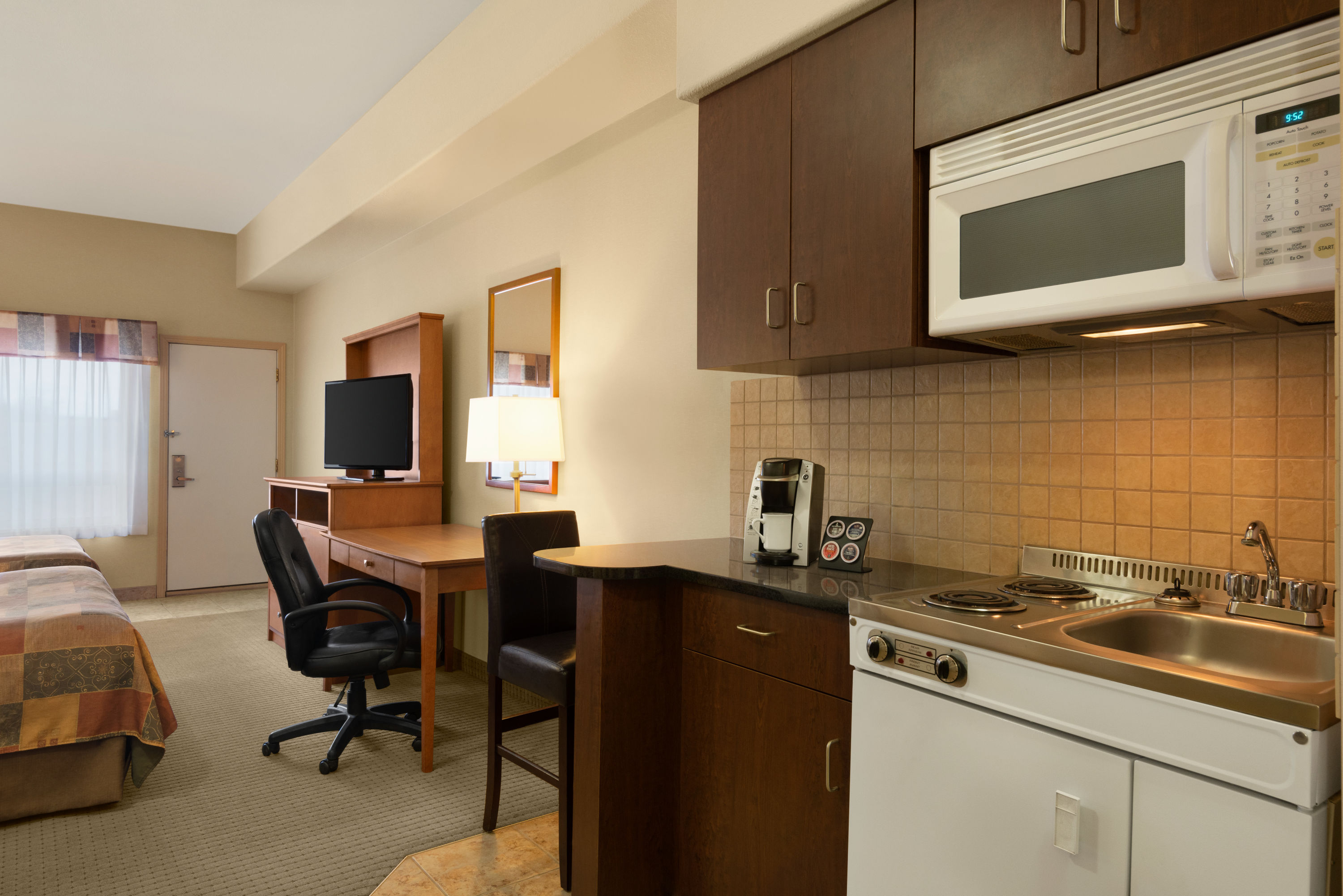Ramada by Wyndham Drayton Valley suite kitchen in Drayton Valley, Alberta