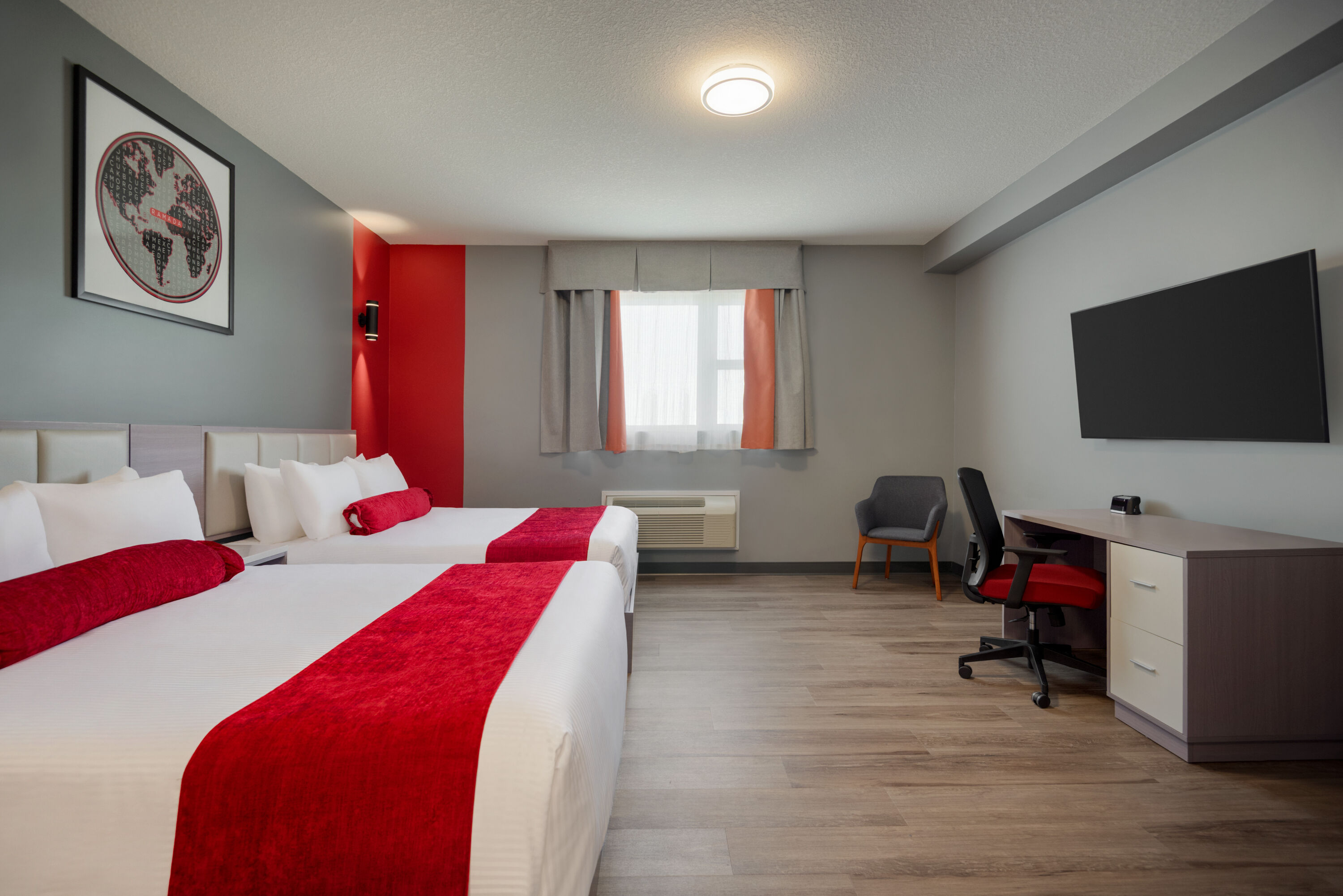 Guest room at the Ramada by Wyndham West Edmonton Hotel & Suites in Edmonton, Alberta