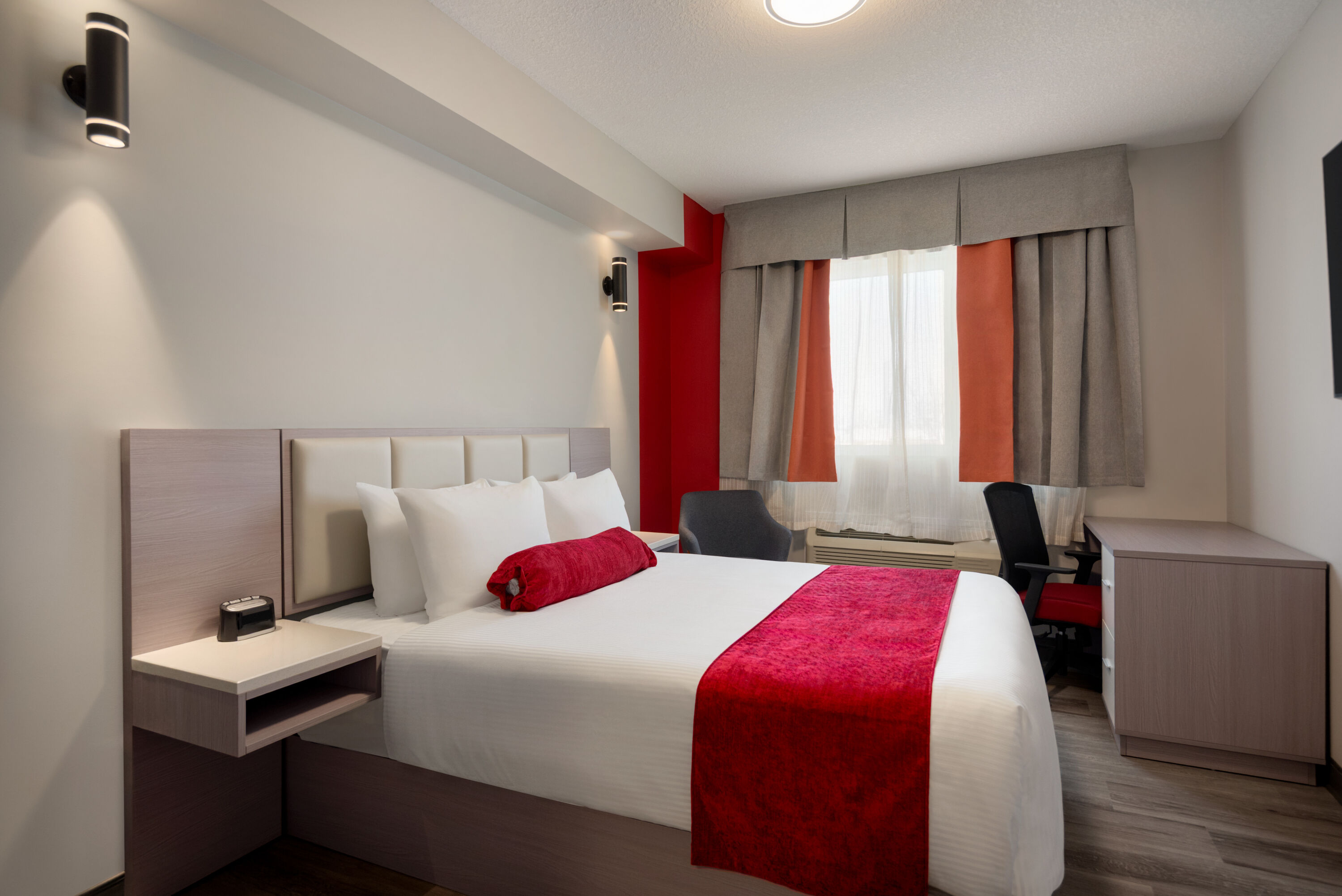 Guest room at the Ramada by Wyndham West Edmonton Hotel & Suites in Edmonton, Alberta