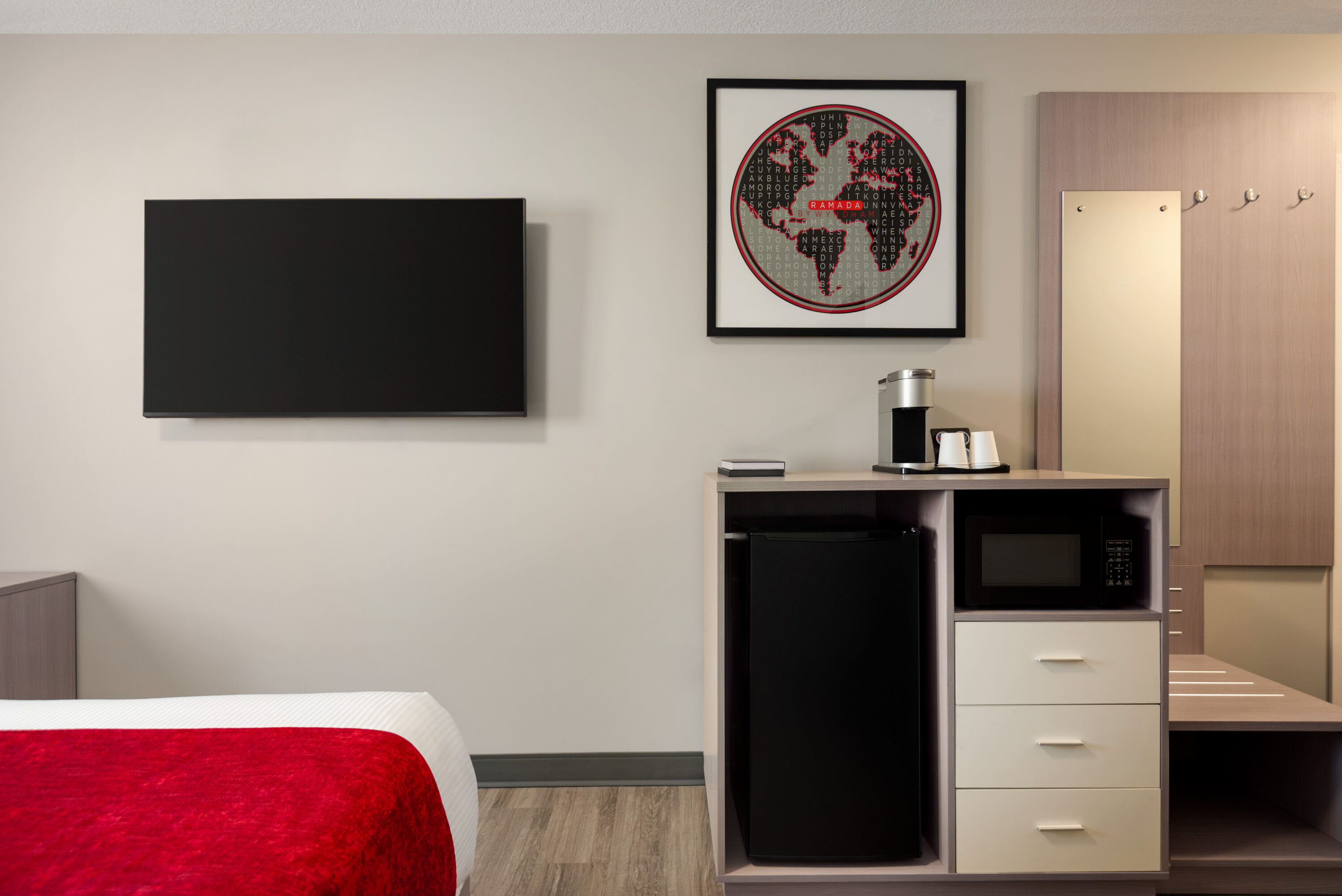Guest room at the Ramada by Wyndham West Edmonton Hotel & Suites in Edmonton, Alberta