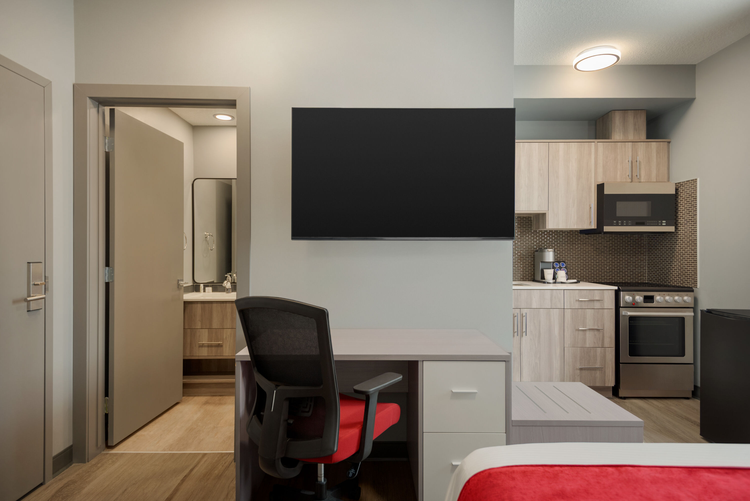 Guest room at the Ramada by Wyndham West Edmonton Hotel & Suites in Edmonton, Alberta