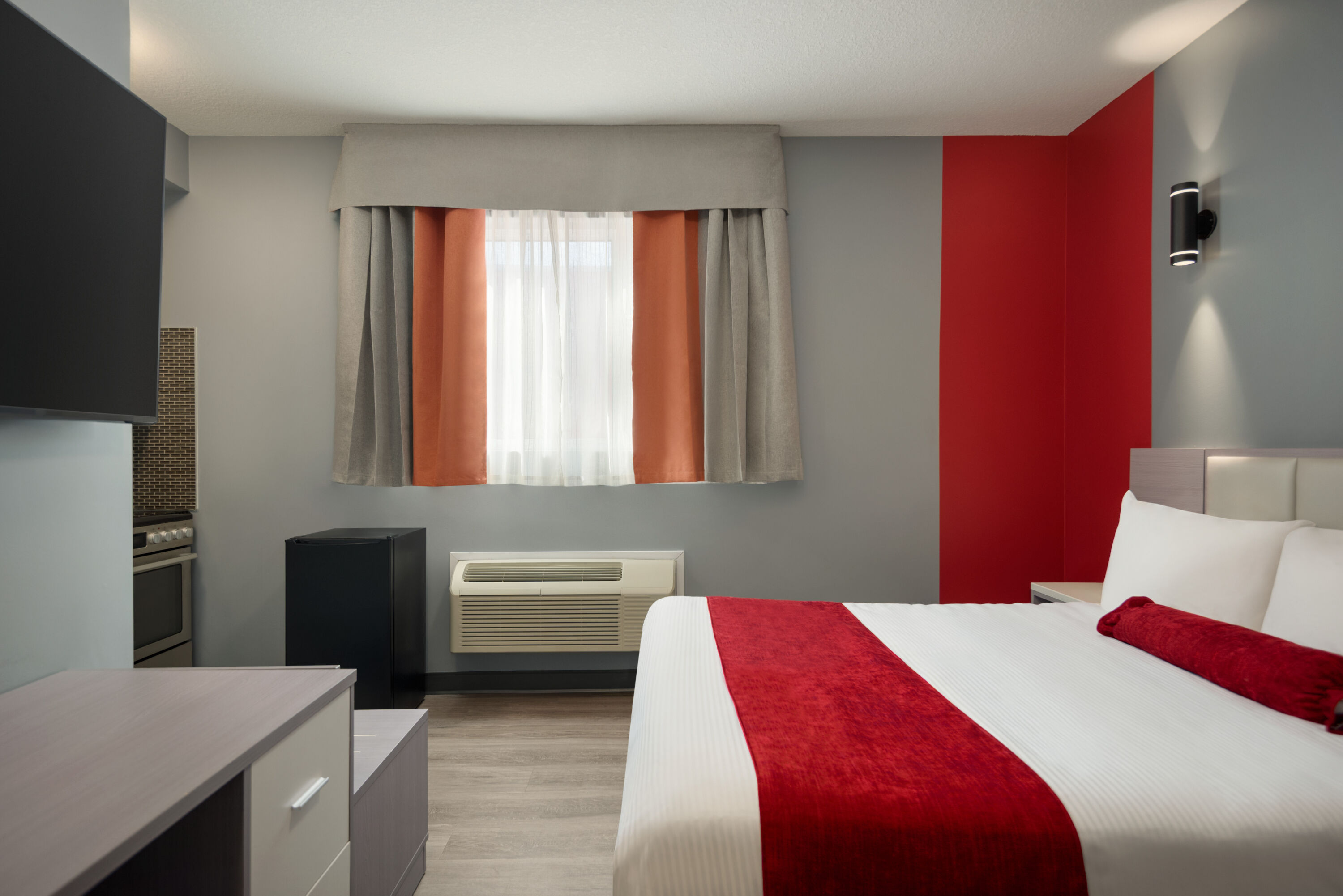 Guest room at the Ramada by Wyndham West Edmonton Hotel & Suites in Edmonton, Alberta