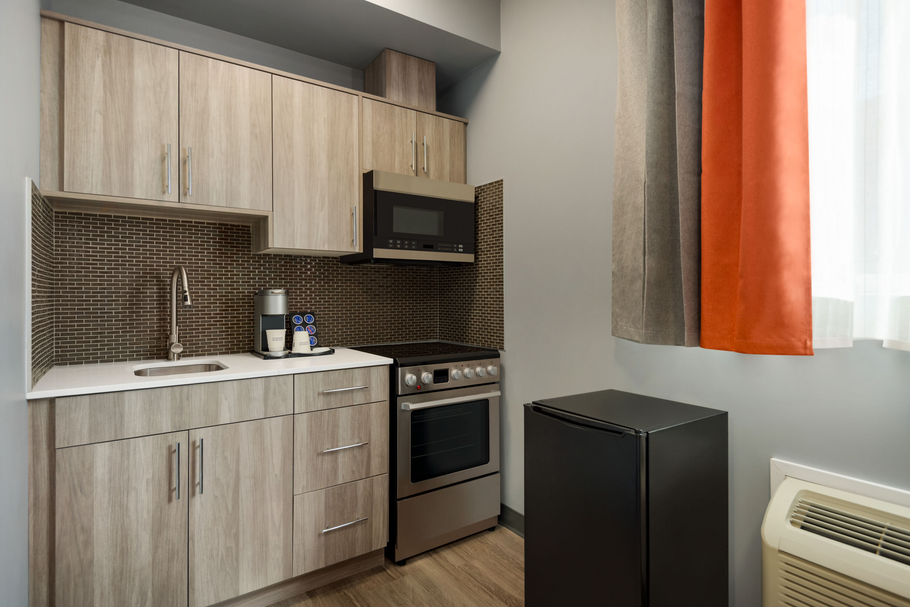 Guest room at the Ramada by Wyndham West Edmonton Hotel & Suites in Edmonton, Alberta