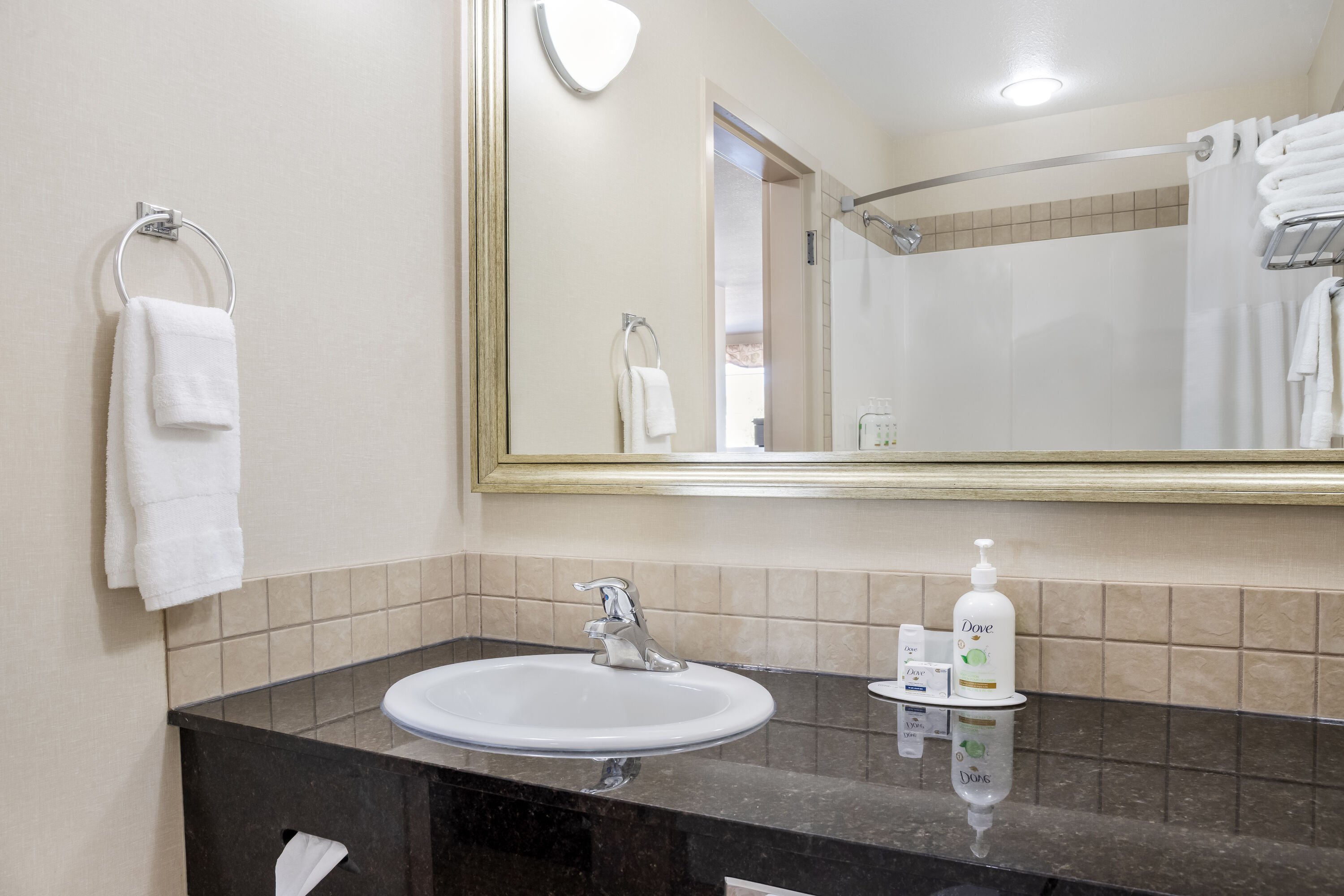 Guest room bath at the Ramada by Wyndham Lac La Biche in Lac La Biche, Alberta