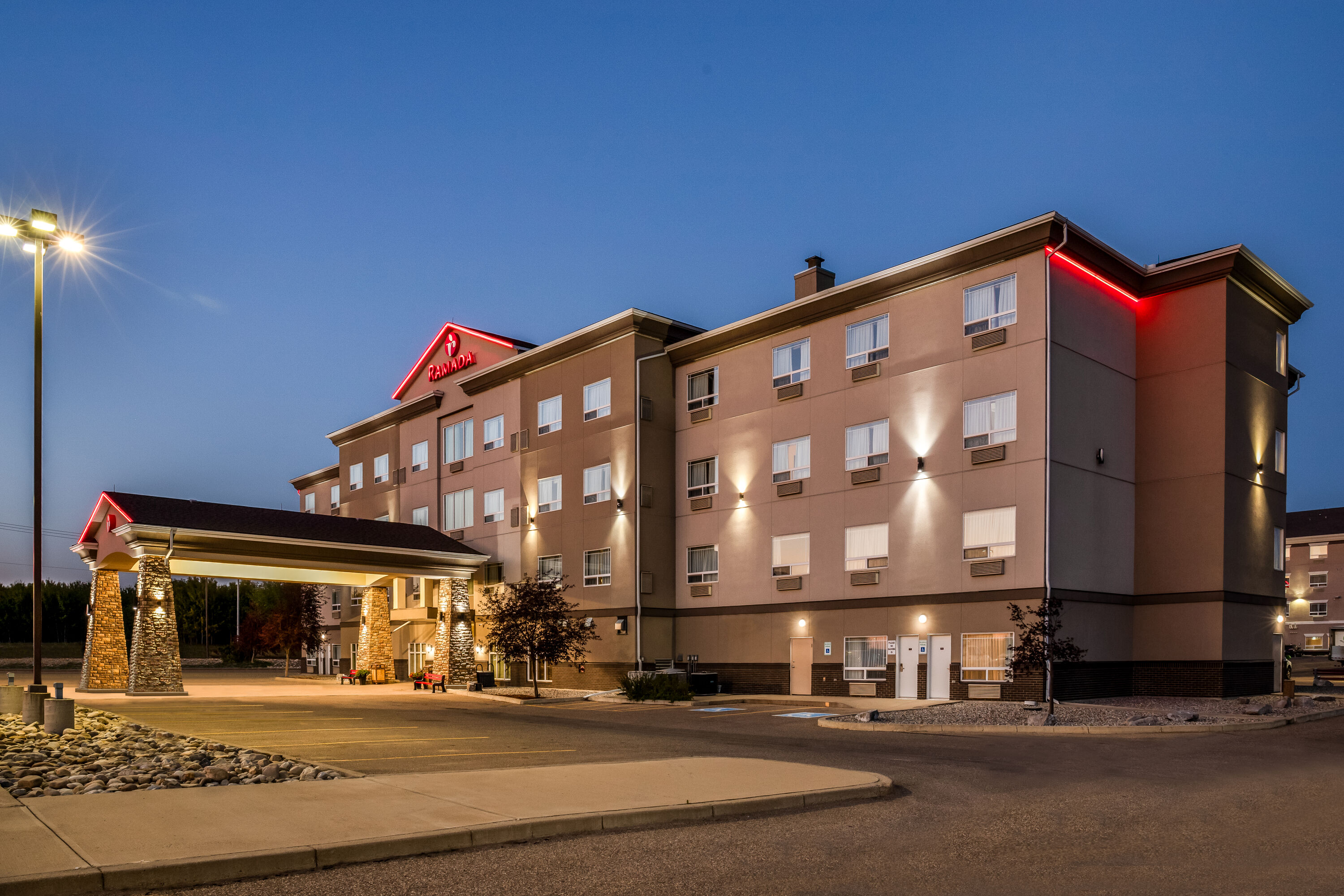 Exterior Dusk Image of Ramada by Wyndham Lac La Biche hotel in Lac La Biche, Alberta