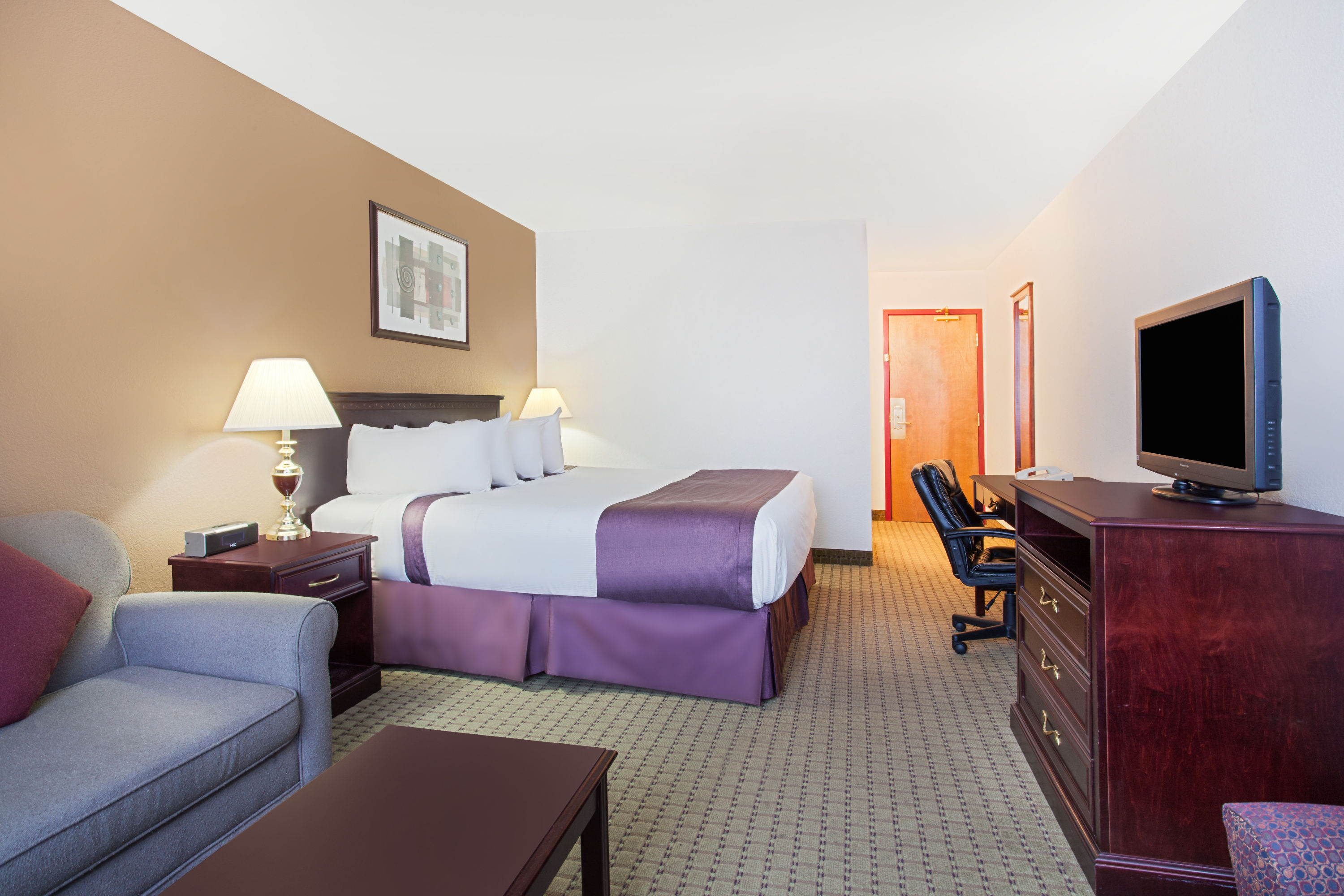 Guest room at the Ramada by Wyndham Red Deer Hotel & Suites in Red Deer, Alberta