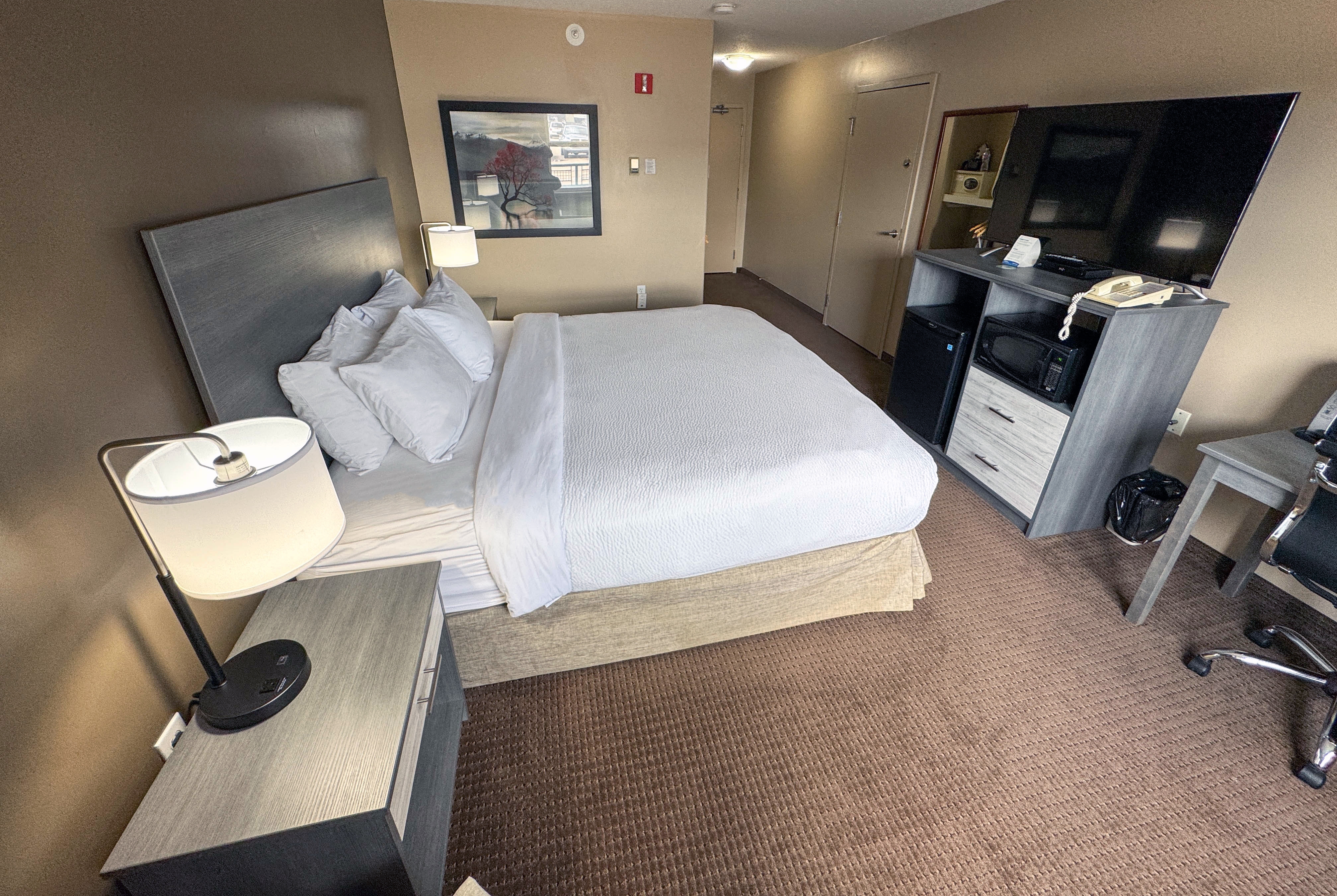 Guest room at the Ramada by Wyndham Sherwood Park in Sherwood Park, Alberta